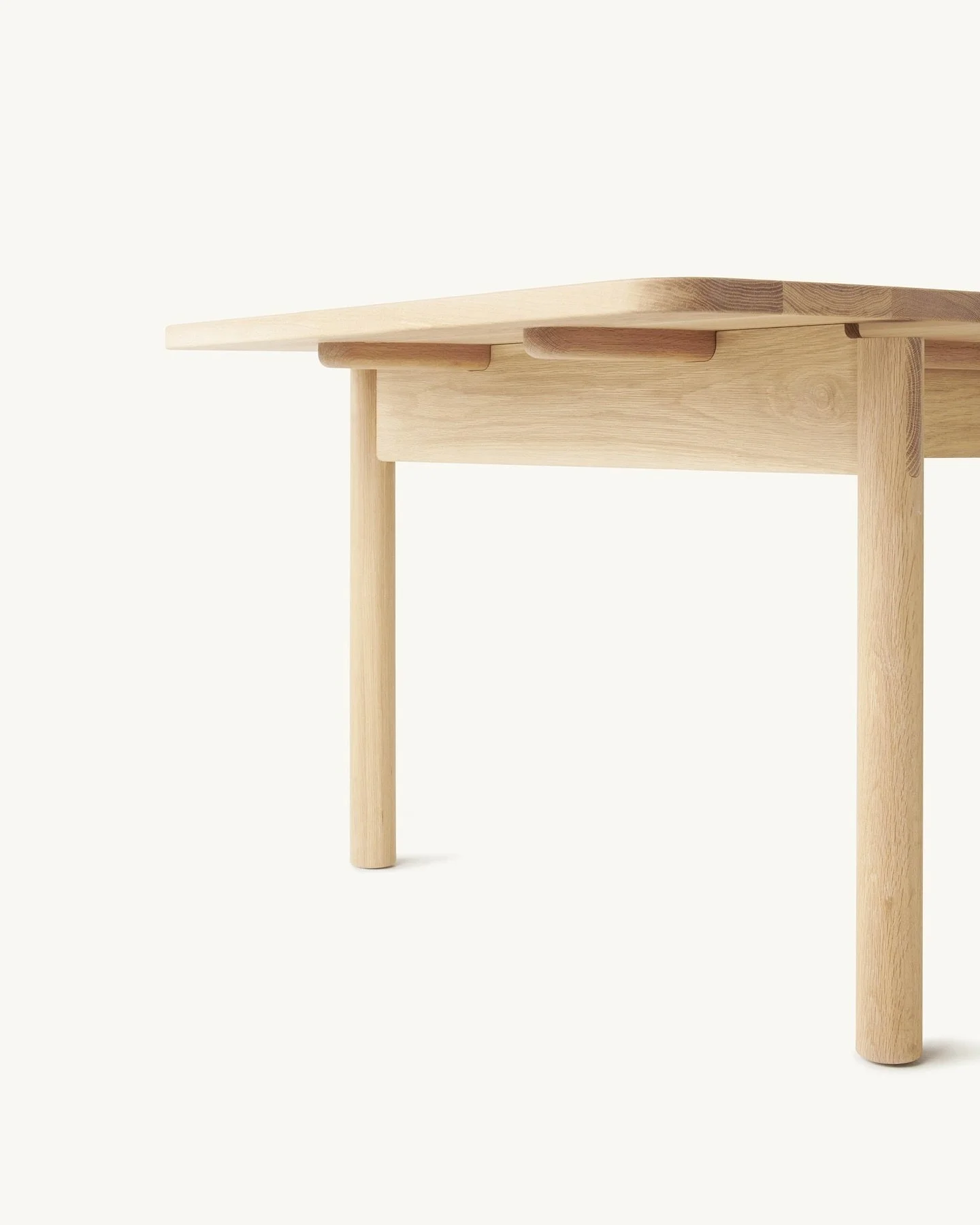 The Together Table Extendable features rails which slide parallel through the table frame. These enable the expansion of the table top. They are rounded in form and we like to refer to them as &lsquo;lollipop sticks&rsquo; :)