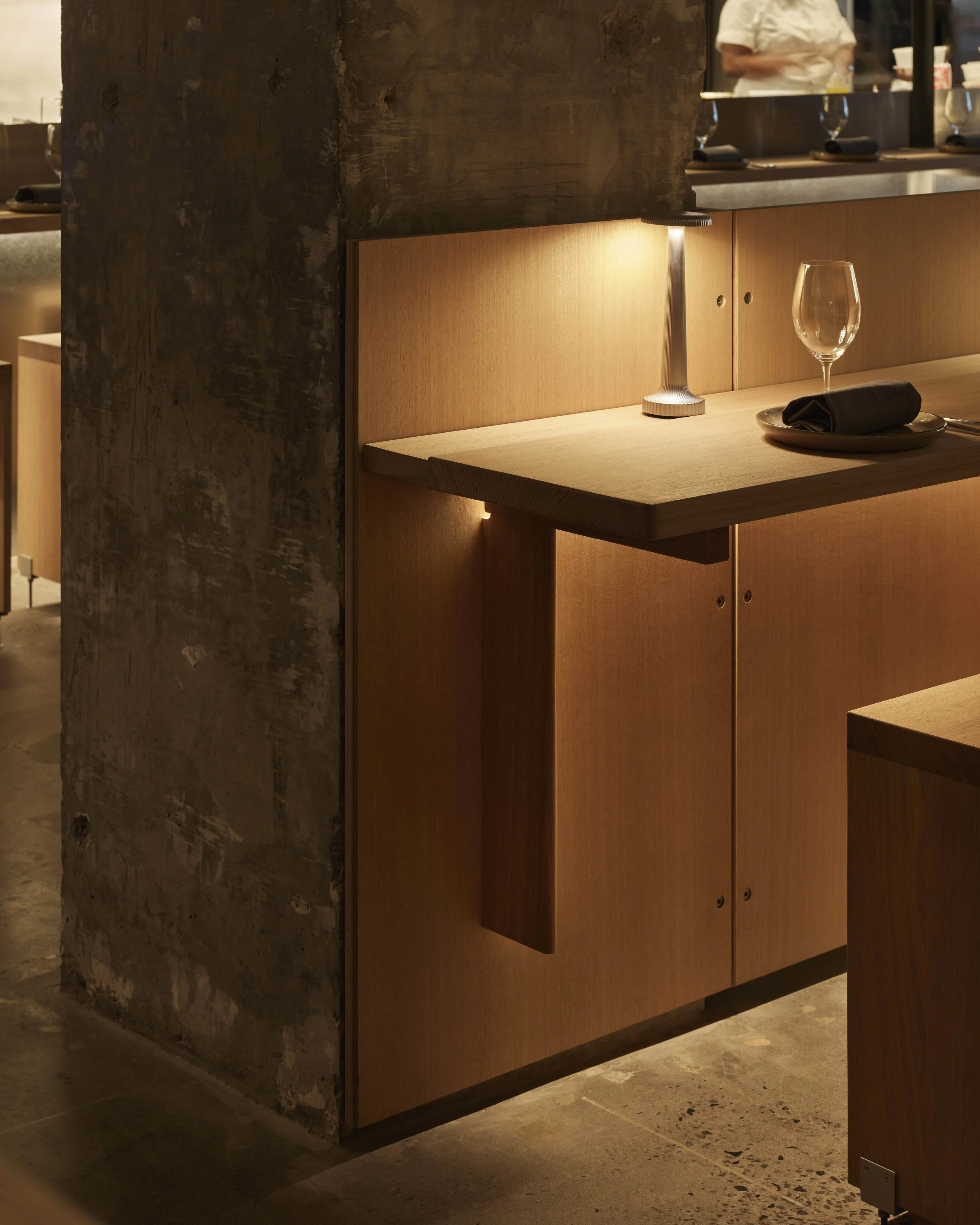 Interior view of Antara - Melbourne, a wood fired Restaurant, Bar & Bakery. Featuring custom made By Dave bench tops and stools.