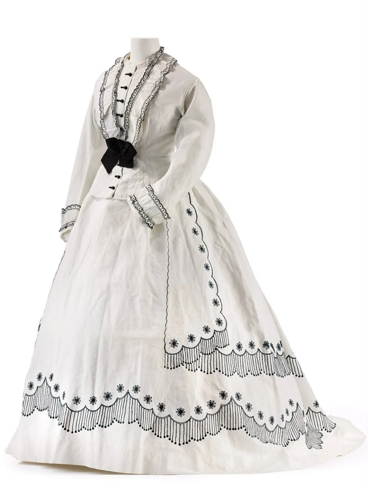 ☀️ &ldquo;This two-piece cotton dress combines a fitted peplum jacket with a wide skirt that extends into a train. The high-necked, linen-lined jacket features a full-length button closure at the front. Its sleeves are long and adorned with wide ruff