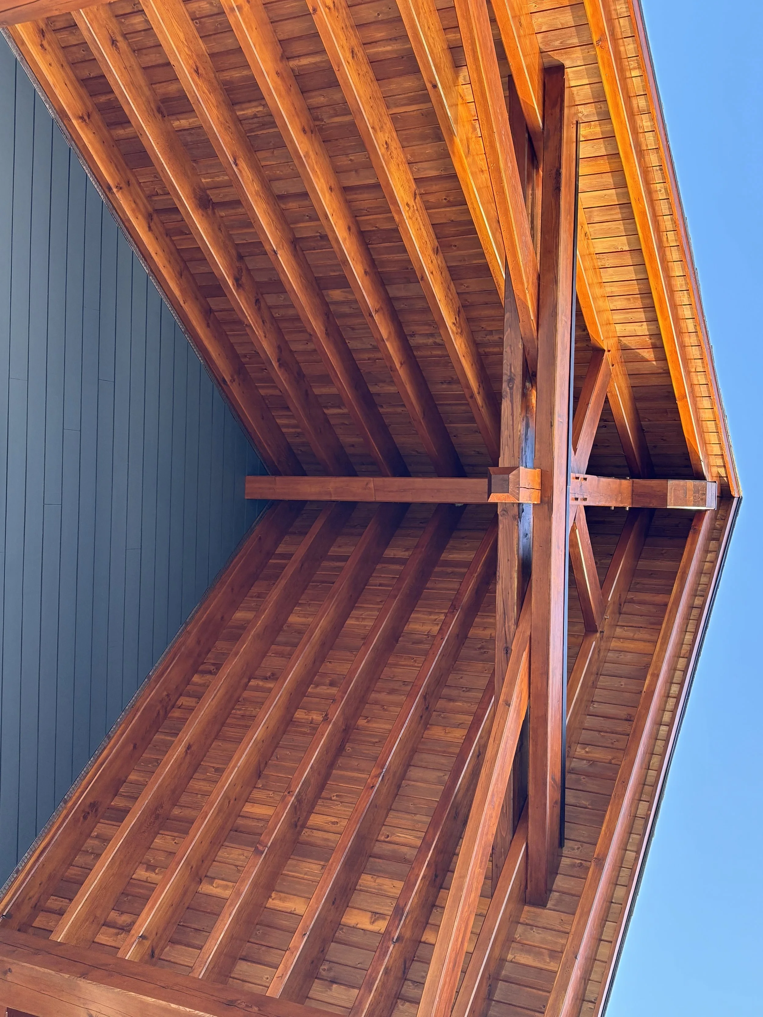 freshly-stained-cedar-soffit-and-cross-beam-detail-on-vernon-bc-home