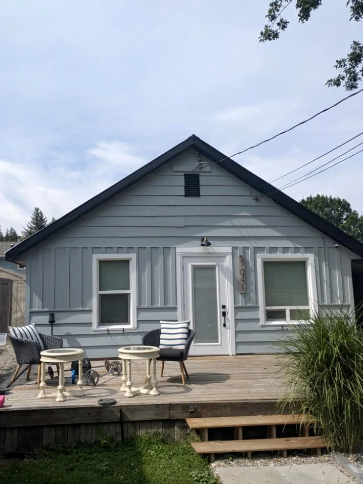 light-blue-exterior-repaint-with-prep-and-caulking-on-vernon-bc-cottage