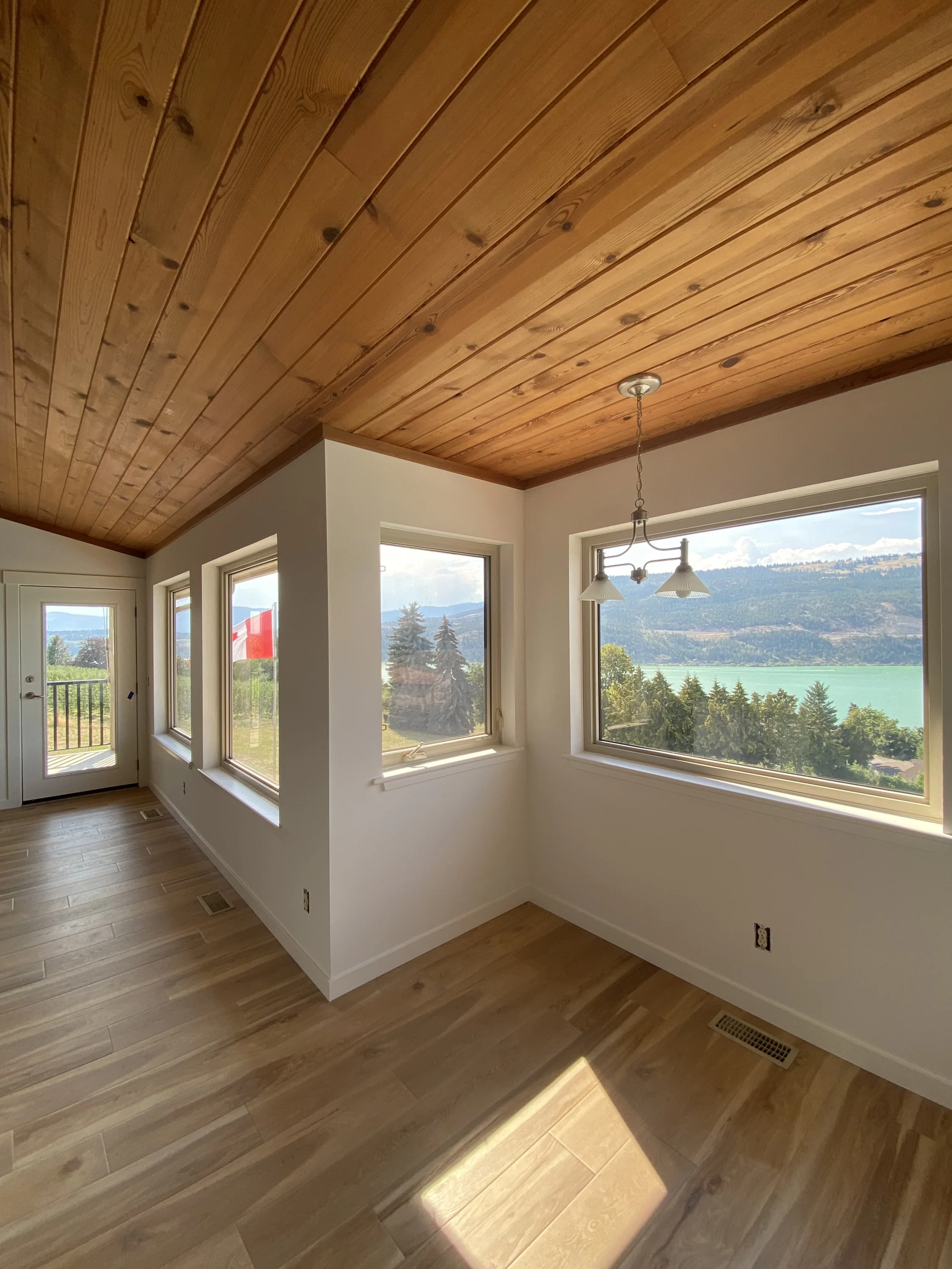 interior-pine-ceiling-stain-in-vernon-bc-home-with-okanagan-lake-views