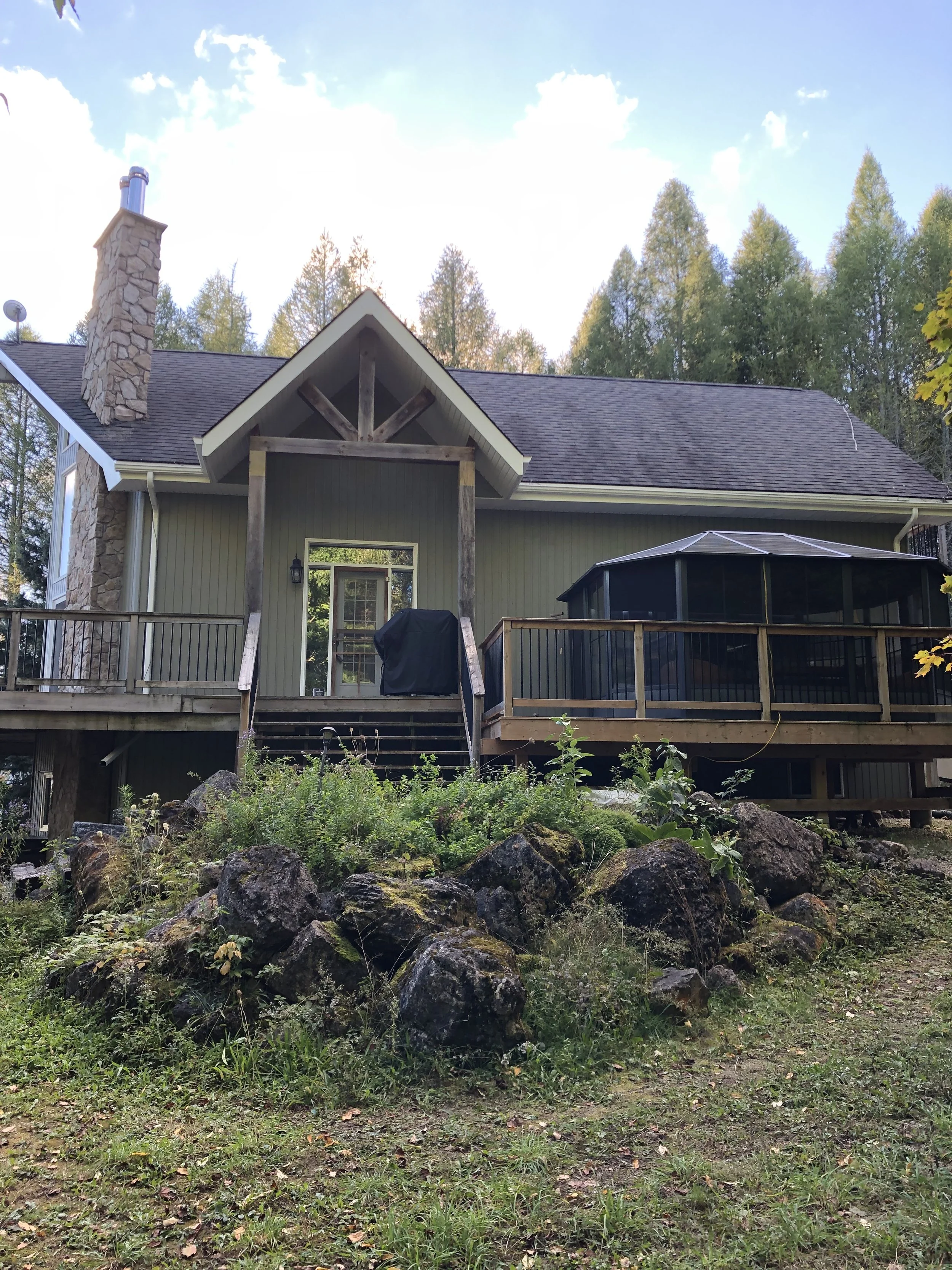 sage-green-exterior-painting-with-timber-accents-on-vernon-bc-home