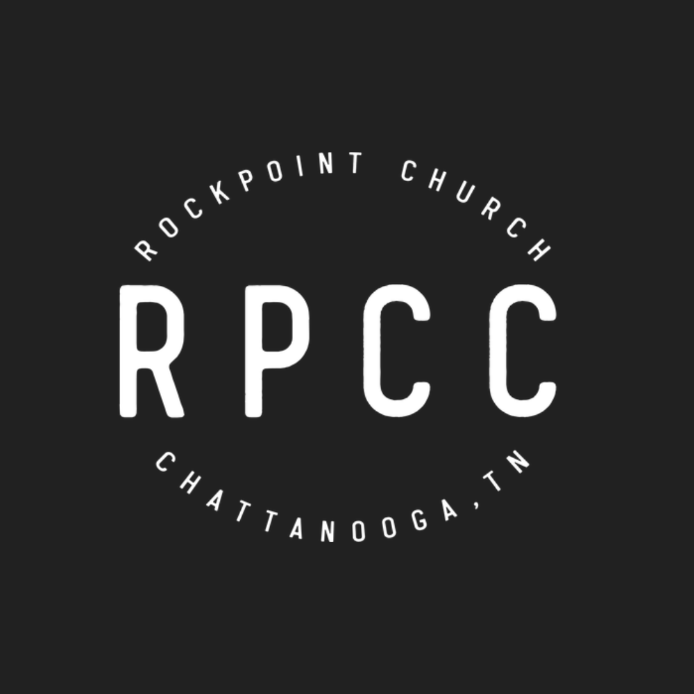 Logo for Rockpoint Church in Chattanooga, TN, with the acronym RPC in large white letters on a black background, and the full name in a circular arrangement around the acronym.