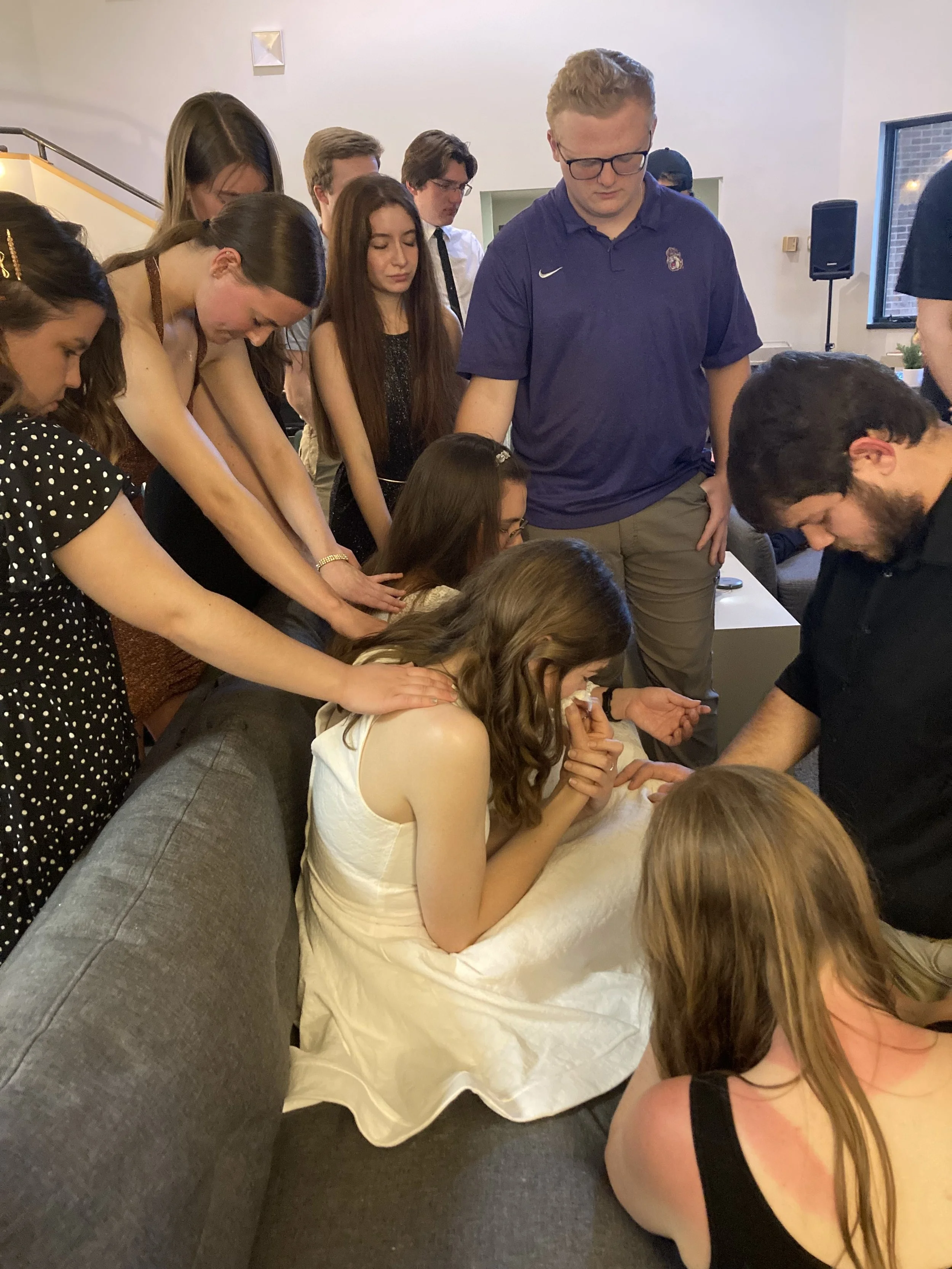 JMU students praying