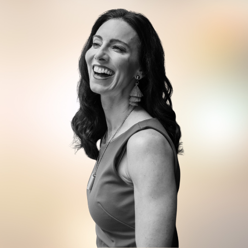 Amanda Hinman black-and-white side profile headshot, smiling