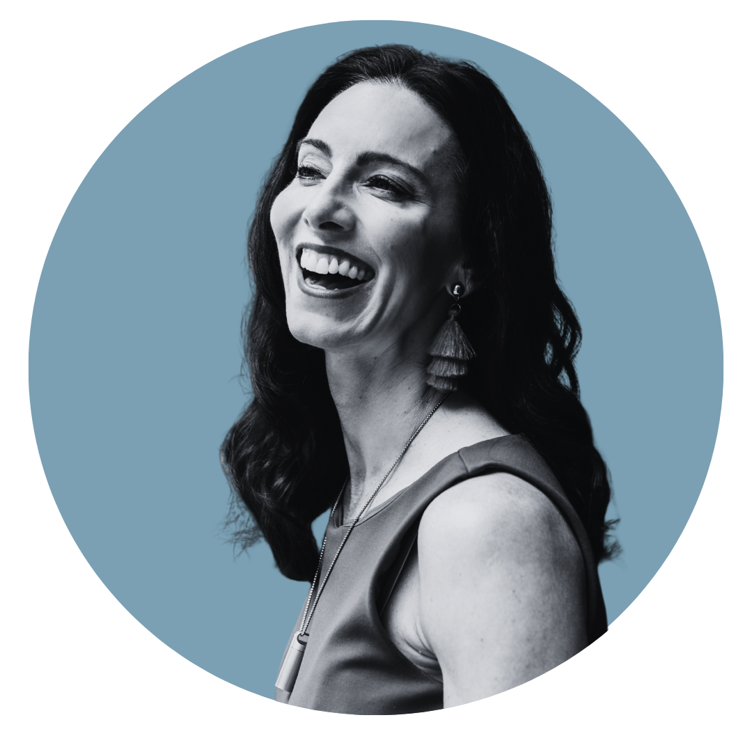 Amanda Hinman black-and-white side profile headshot, smiling