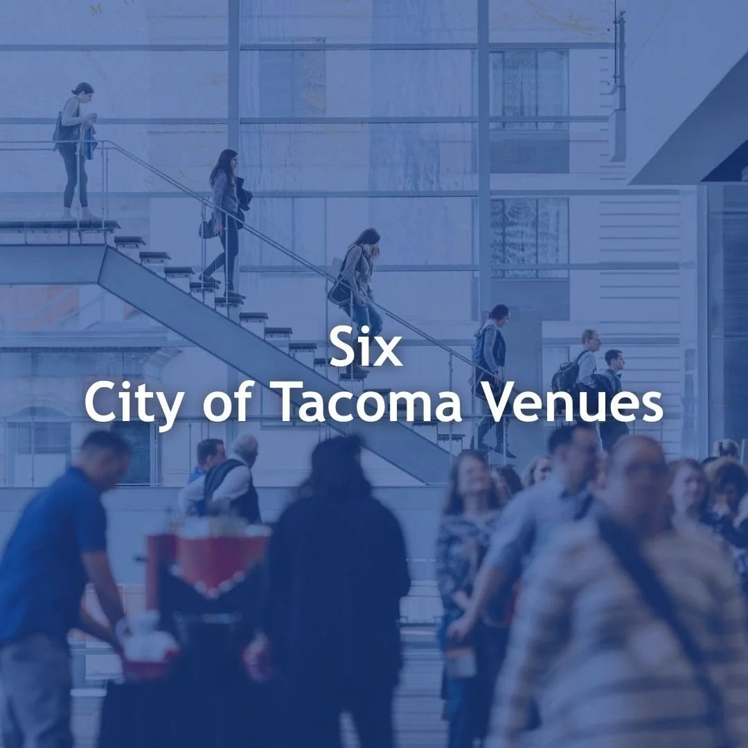 Photo of people walking down the stairs and other walking on the main floor at the Convention Center. Text readsSix City of Tacoma Venues