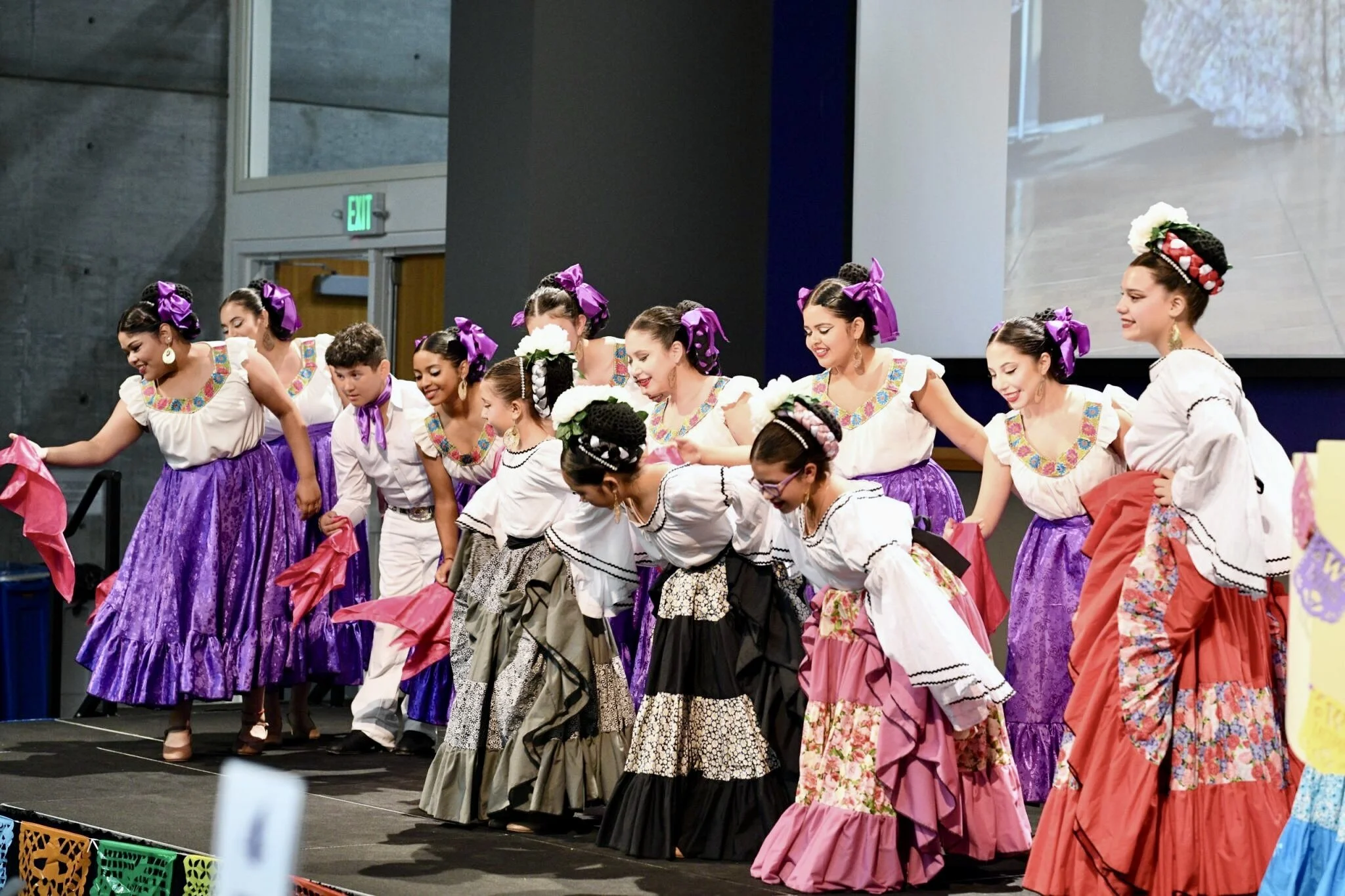 Photo of group of girl wearing Mexican dance dresses