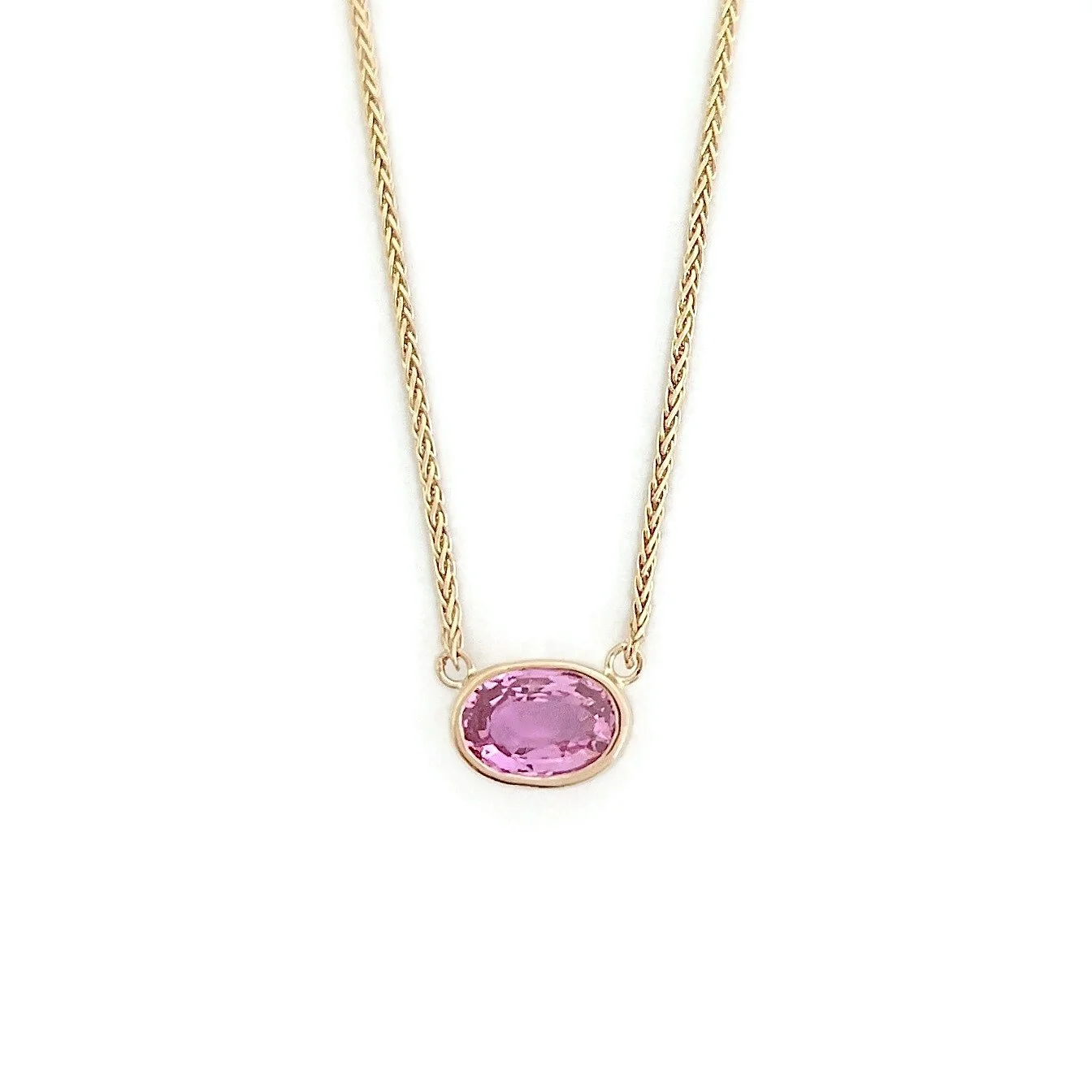 Oval Pink Sapphire Bezel Solitaire Pendant Necklace in Rose Gold