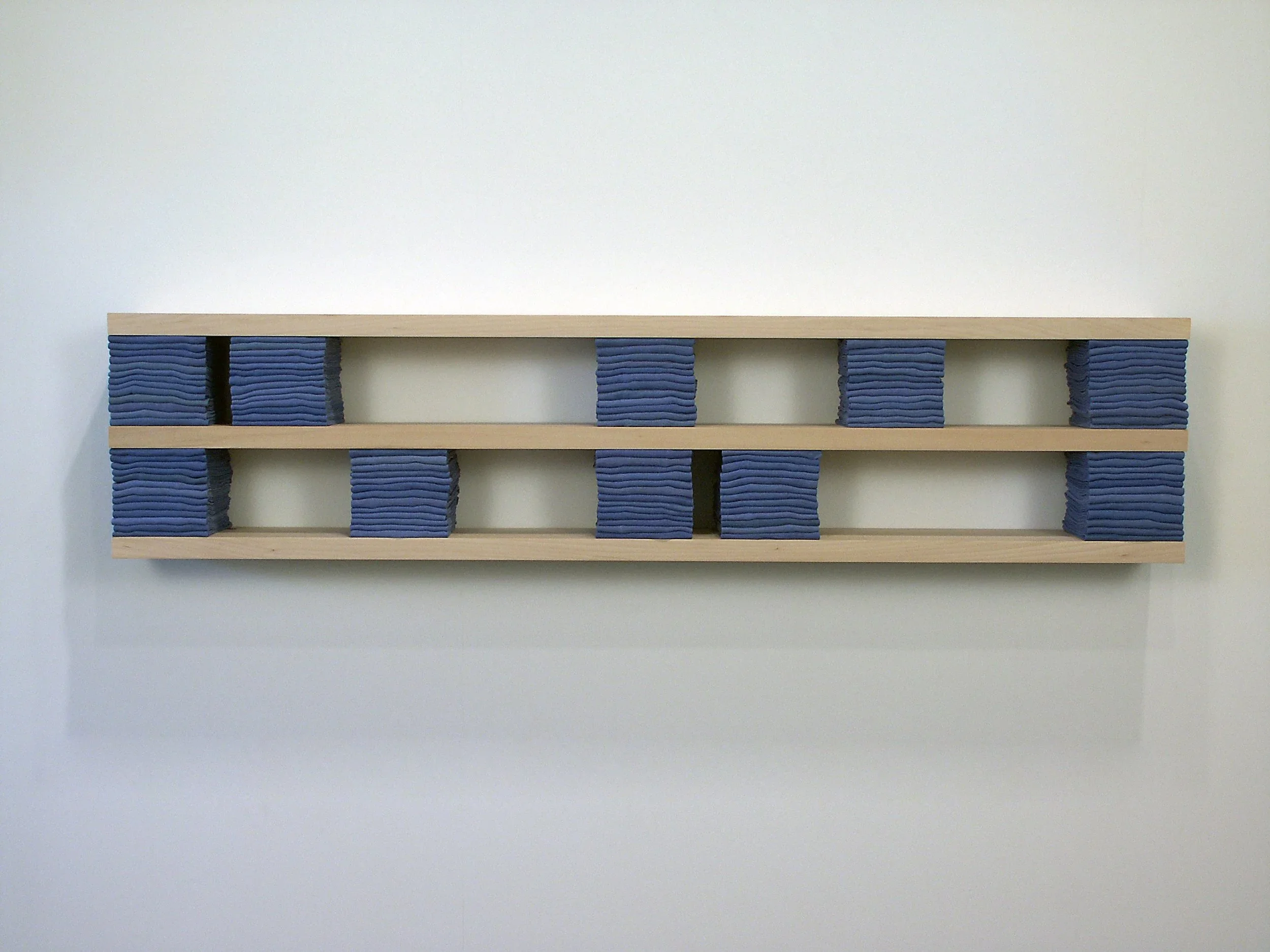   Compress #2 , 2003  used surgical towels, steel, basswood 72×7×16in