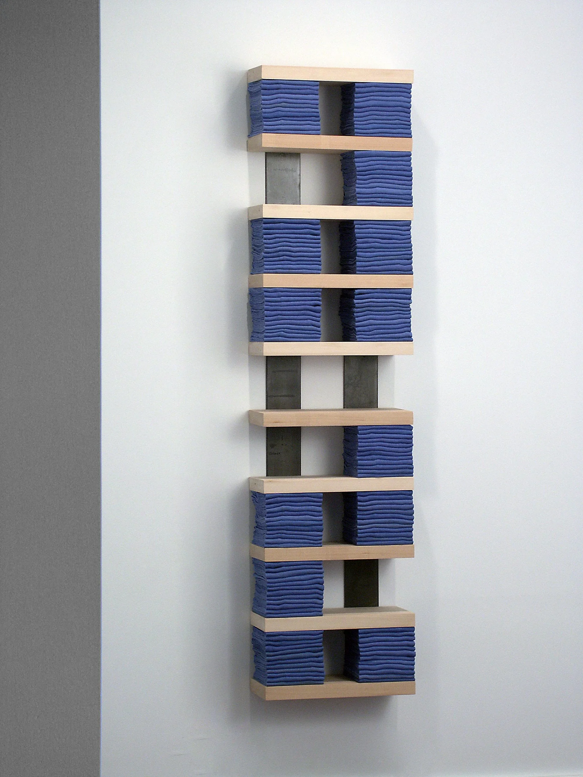 Compress (Vertical), 2003 used surgical towels, steel, basswood, 17" x 7" x 69"