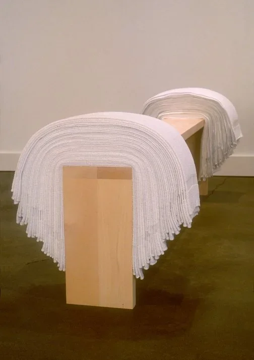   Accretion: Separate, detail , 2001  used terry hospital towels, basswood 72×9×32in approx. each, 5 benches