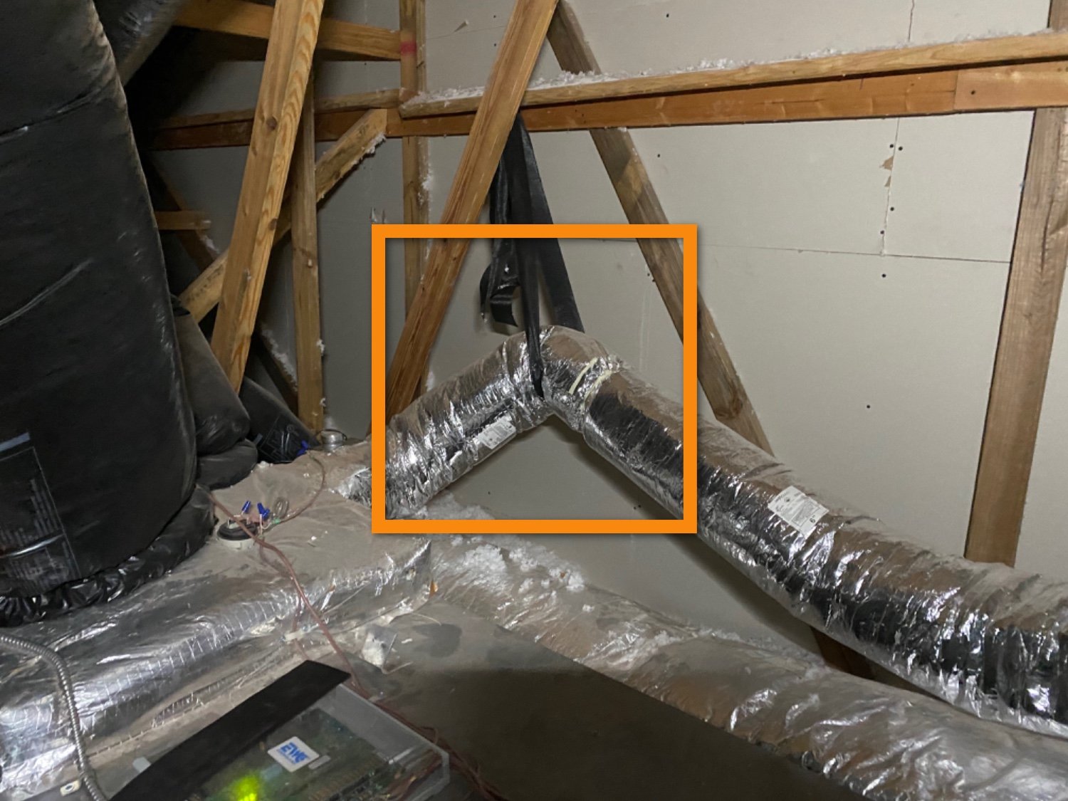 Airflow restriction in attic furnace duct.