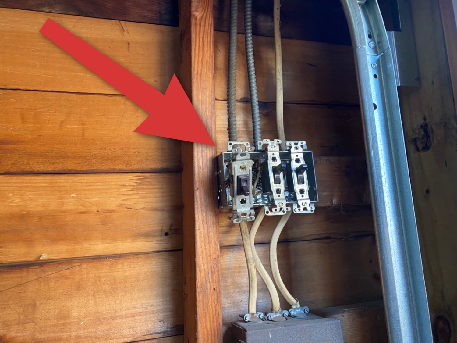Loose/exposed electrical wiring. Missing cover plate.