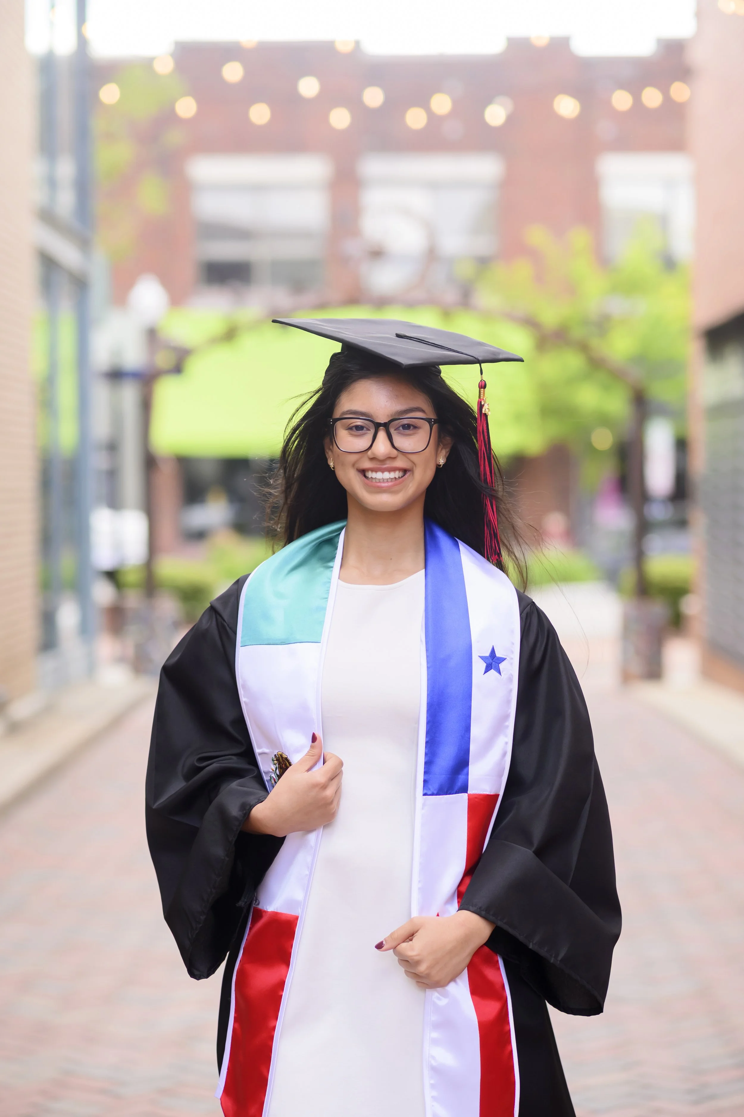 Lee Early College Graduate cap and gown photo in downtown Sanford by Jamie Loomis Photography