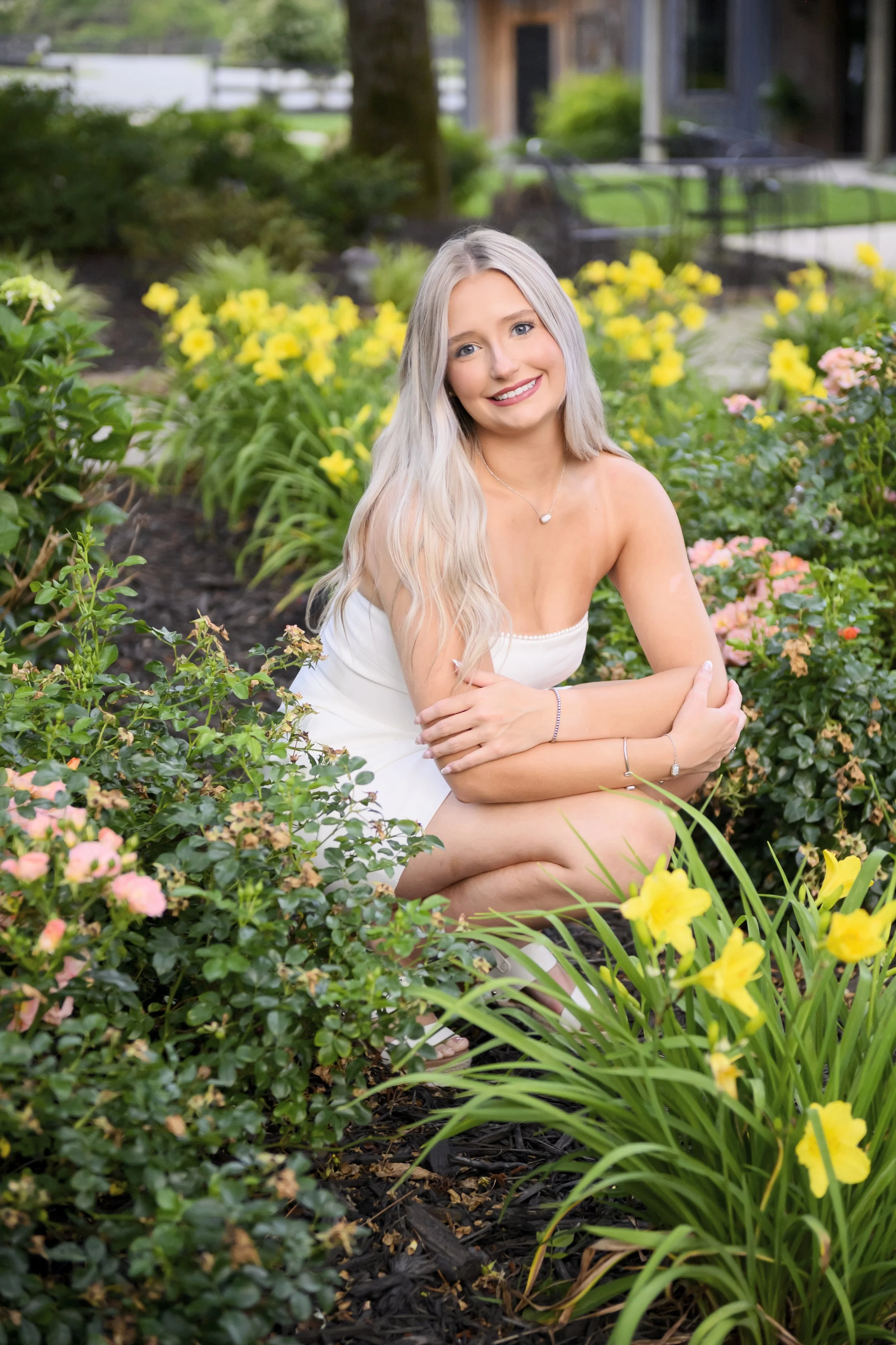 Floral Senior photo by Jamie Loomis Photography at John B Thomas Gathering Place in Sanford.