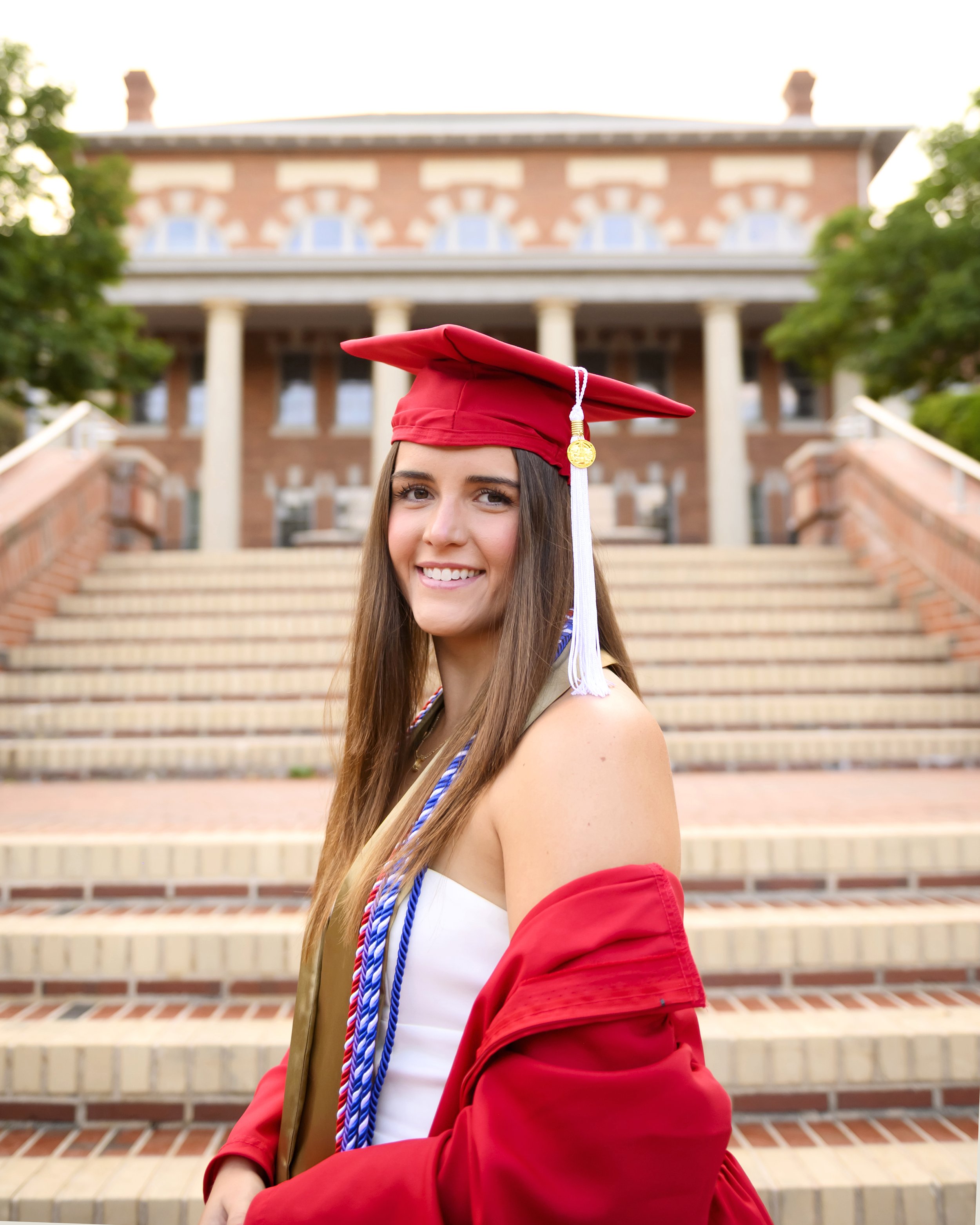 NC State College Graduate cap and gown photo at the Court of Carolinas in Raleigh by Jamie Loomis Photography