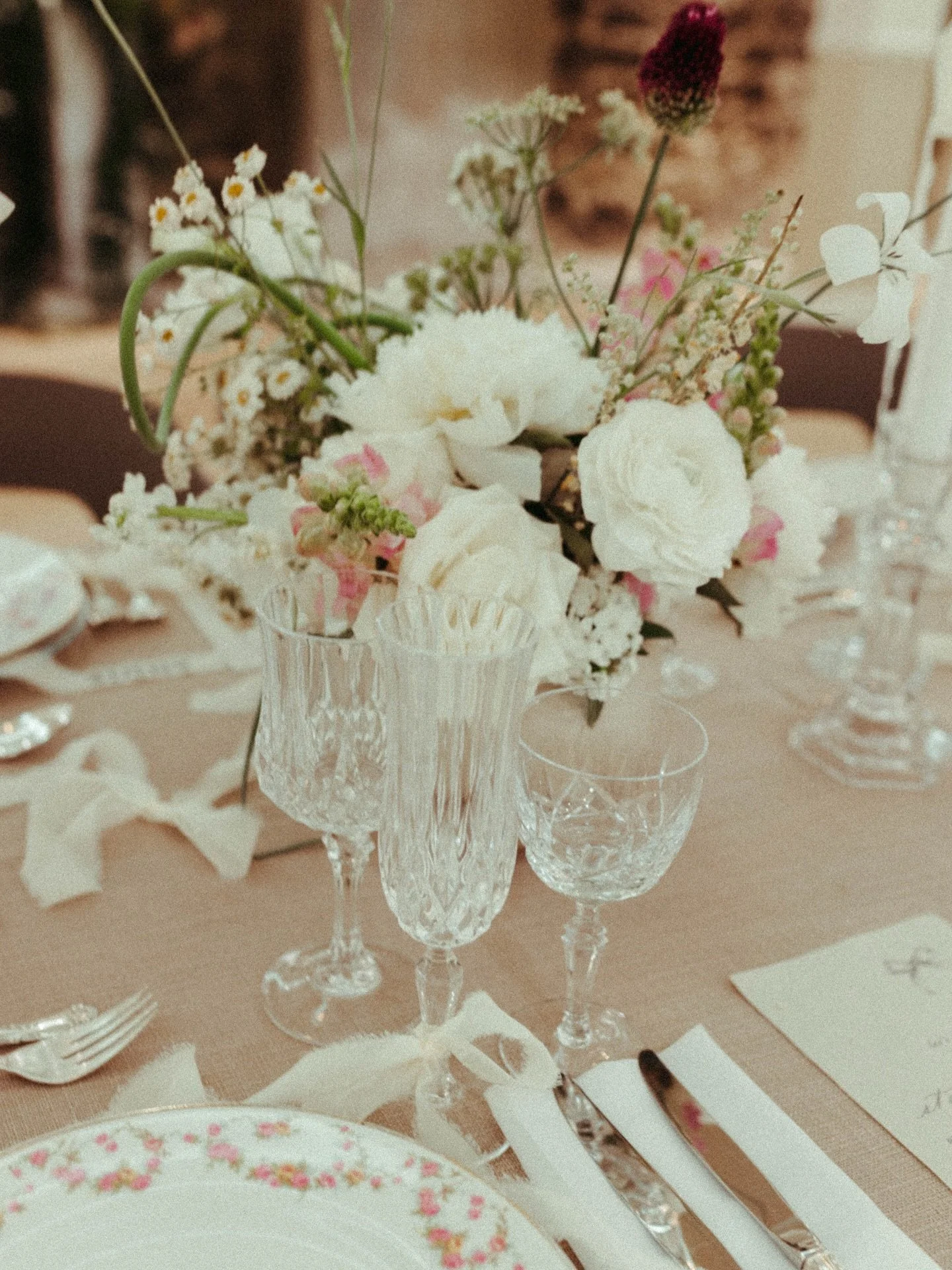 A soft-focus moment &mdash; cut crystal, vintage florals, and pure wedding day magic. ✨As your month-of coordinators, we handle the details so all you have to do is enjoy the day.⁣
⁣
⁣
Creative Team⁣
⁣
Planning and design: @seaandsilkevents ⁠⁣⁣
Flora