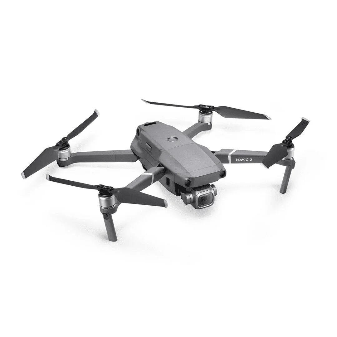 Gray DJI Mavic 2 drone with four propellers and camera, isolated on white background.