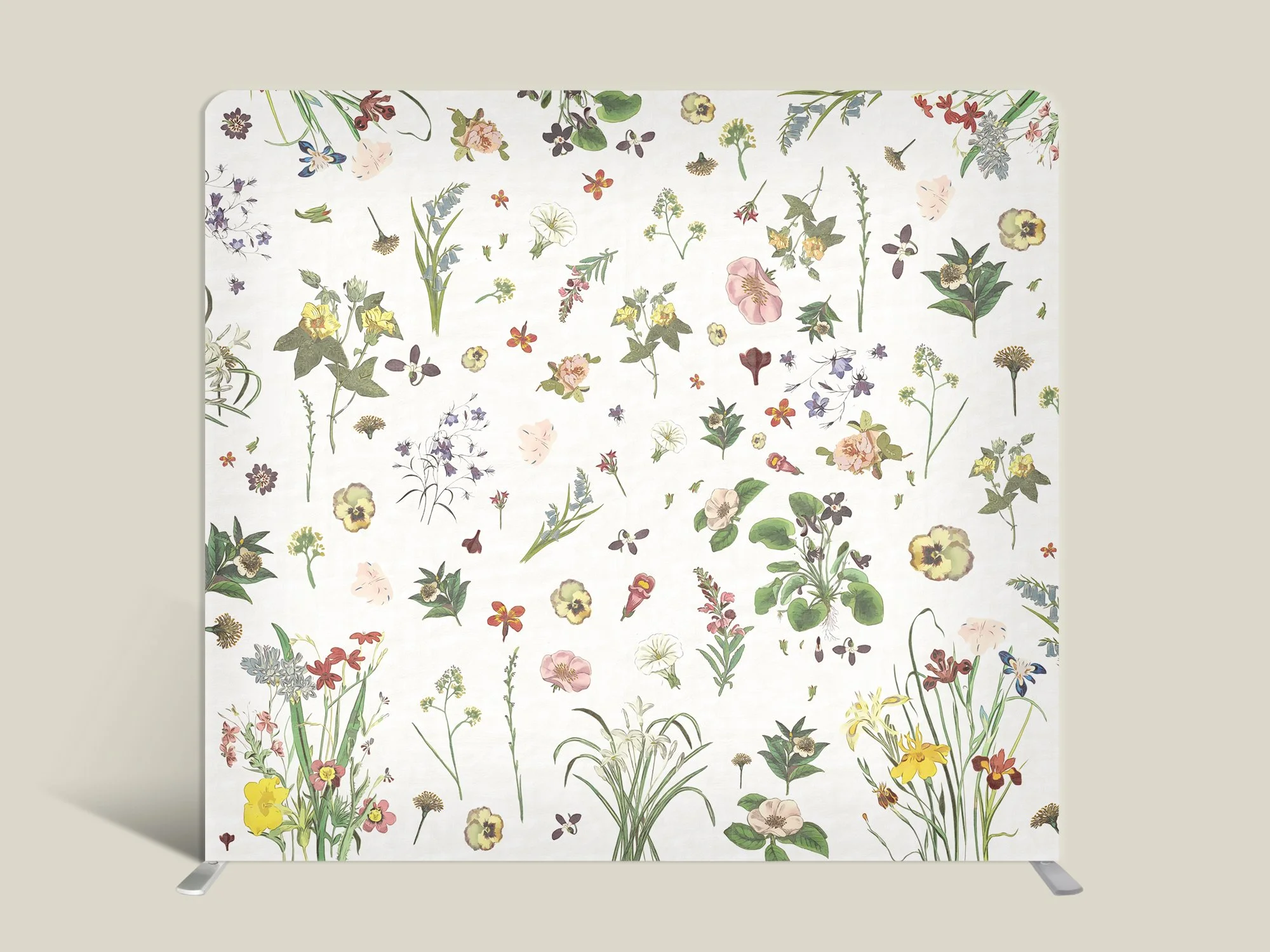 An artistic photo backdrop with a floral pattern featuring various types of flowers and plants in pastel colors set against a white background.