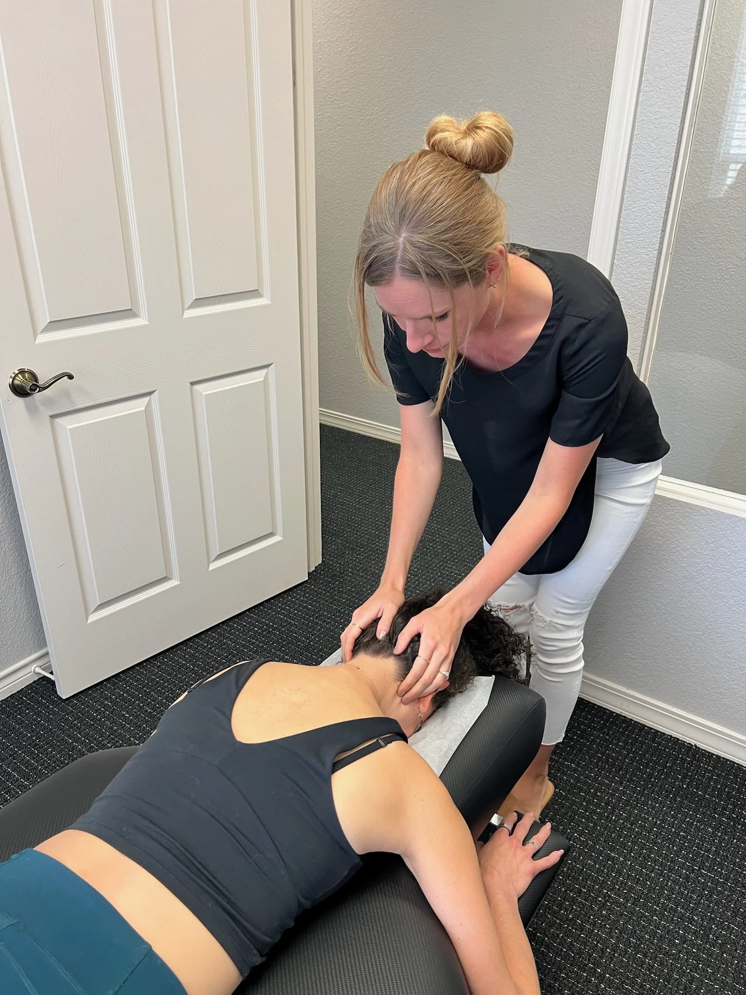 Upper cervical chiropractic adjustment for an adult patient at Be Well Chiropractic in Lakeway, TX