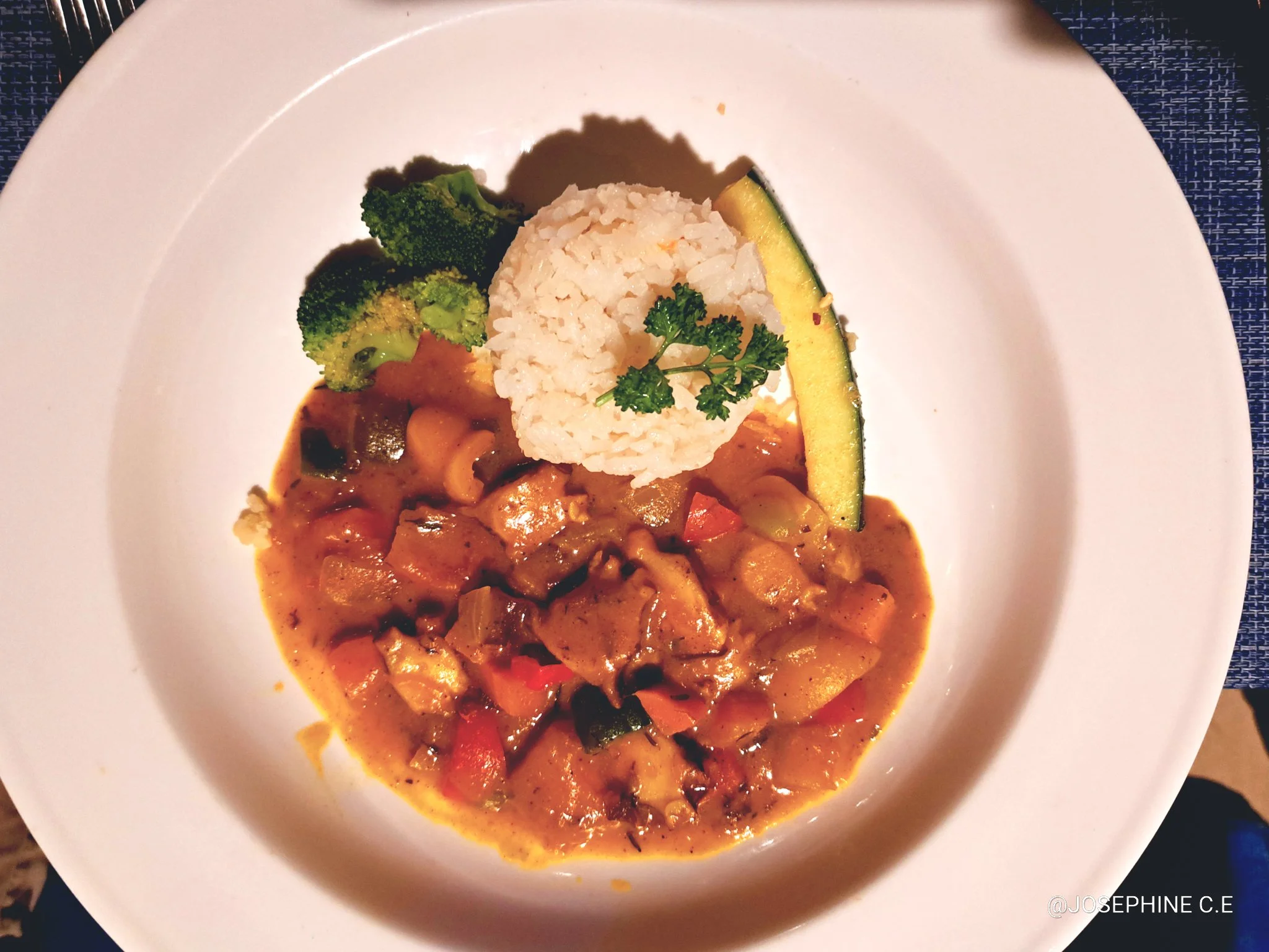 Jamaican Curry Octopus with side of rice.