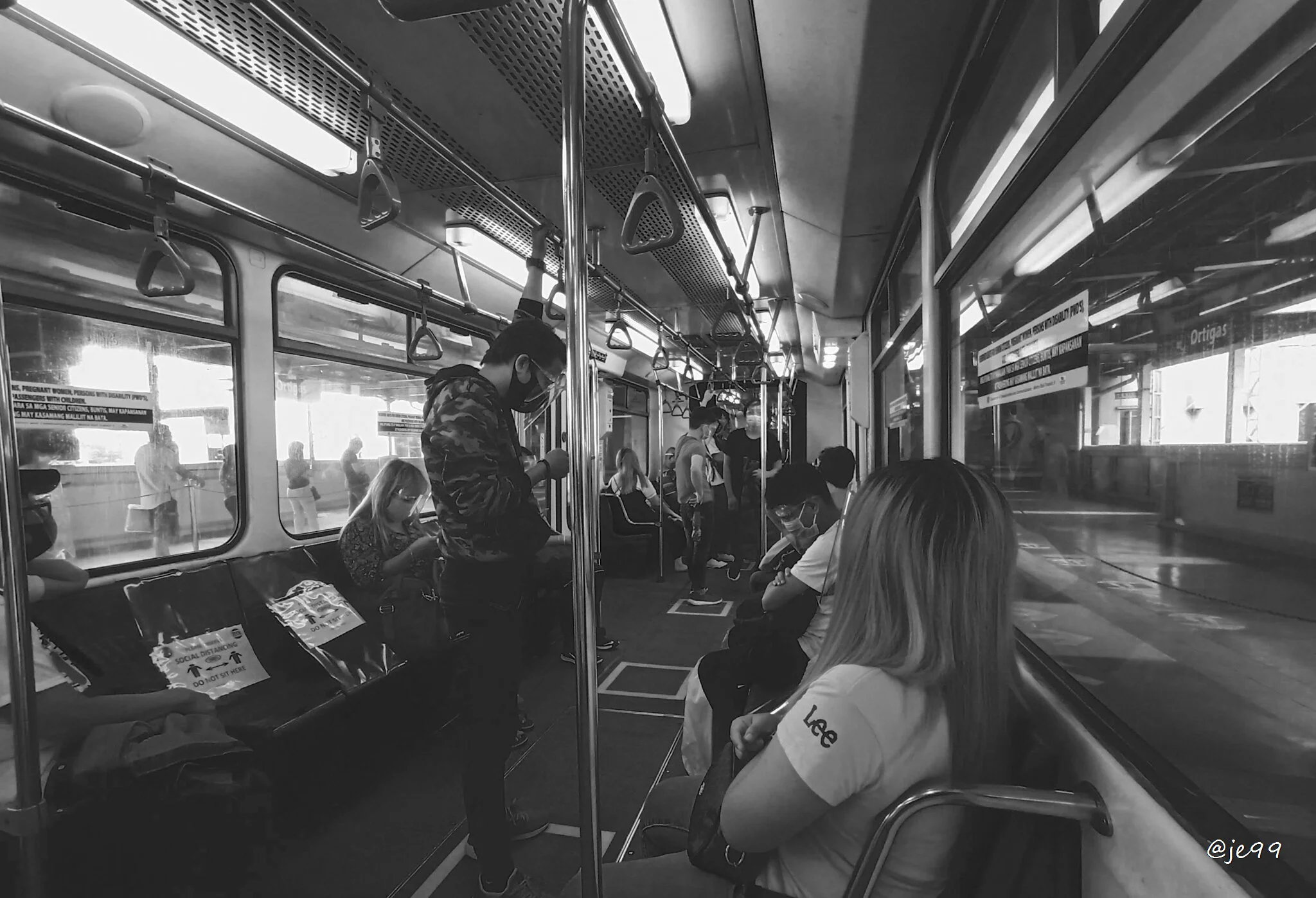 The MRT (Mass Rapid Transit) view inside, this photo was taken 10.15.2020. After Covid-19 restrictions lifted, inside of MRT, talking isn't allowed yet. 