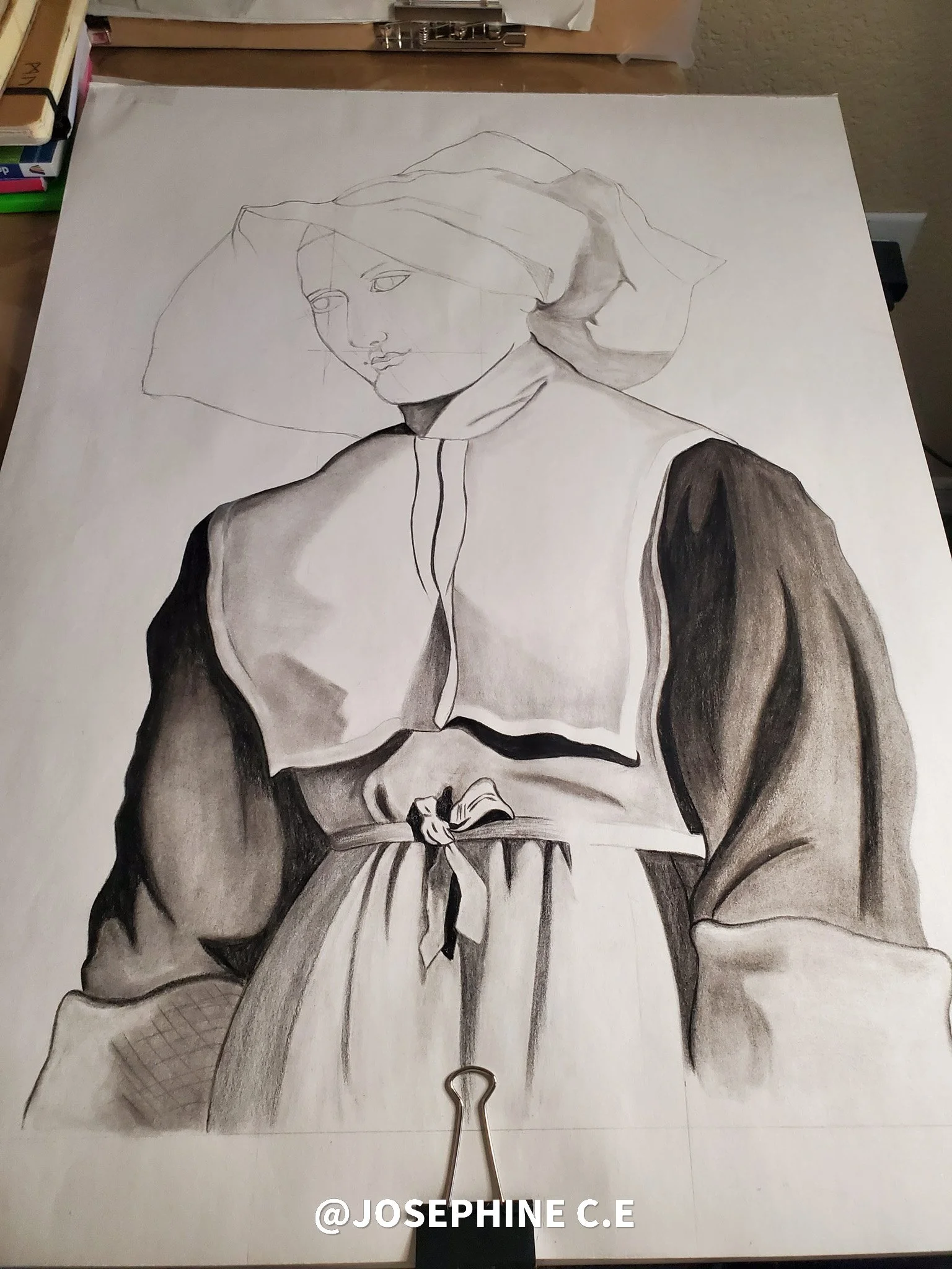 A detailed pencil drawing of a woman in traditional clothing, with a headscarf, depicted in a classical style.