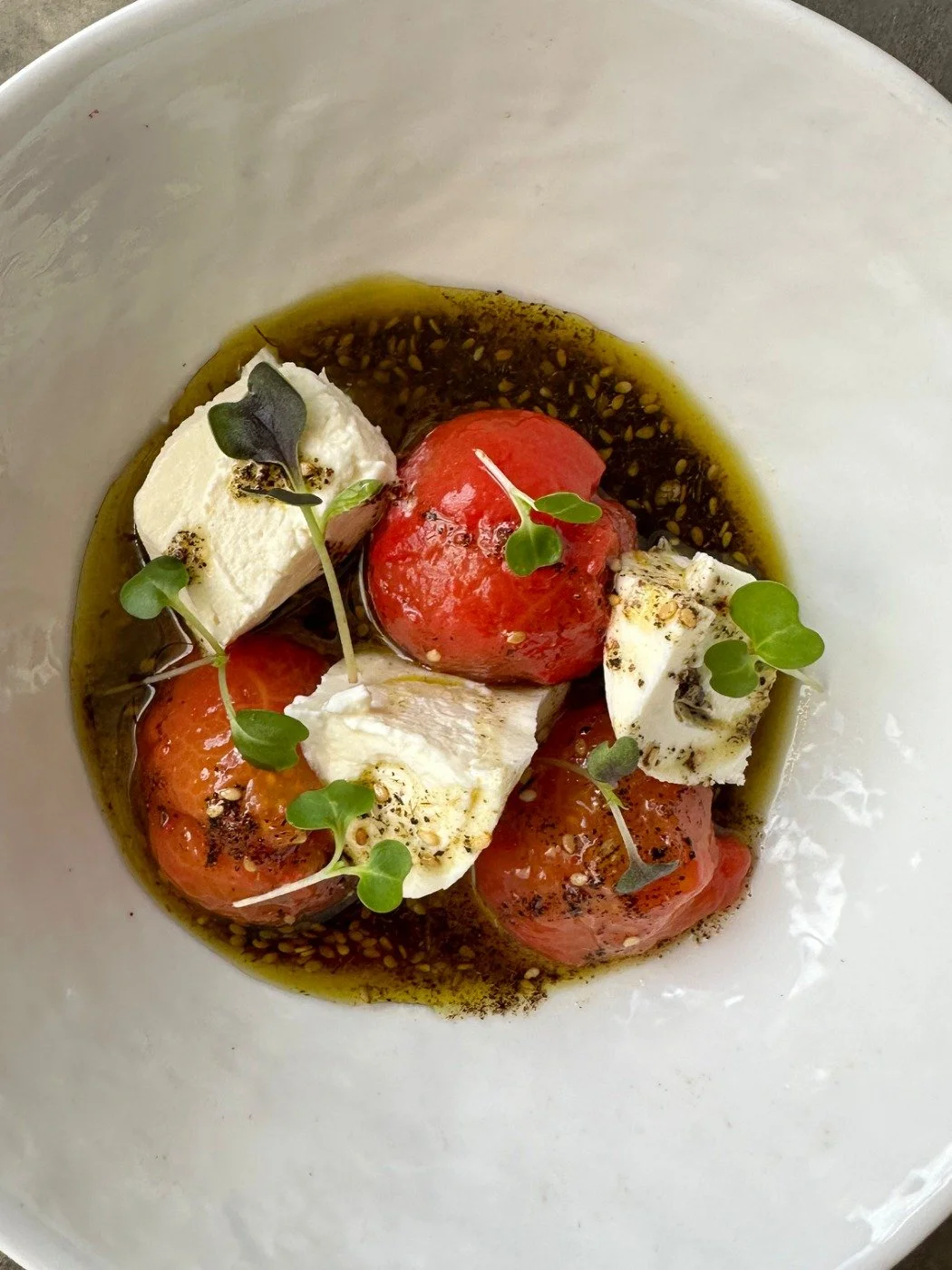 tomato, zaatar oil served with burrata 