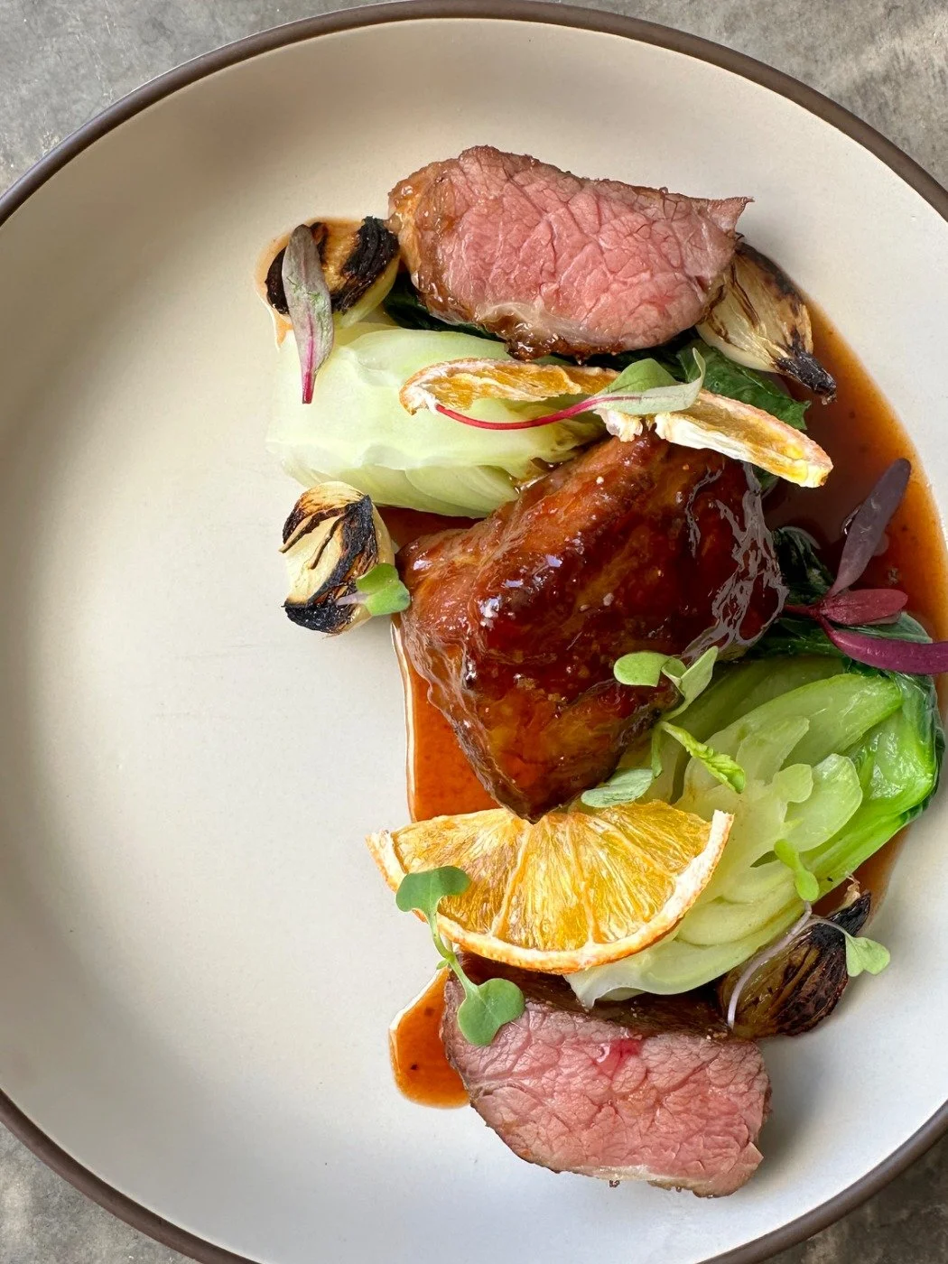 48 hour sou vide short rib, gochujang and orange glaze, bock chow, orange segments 