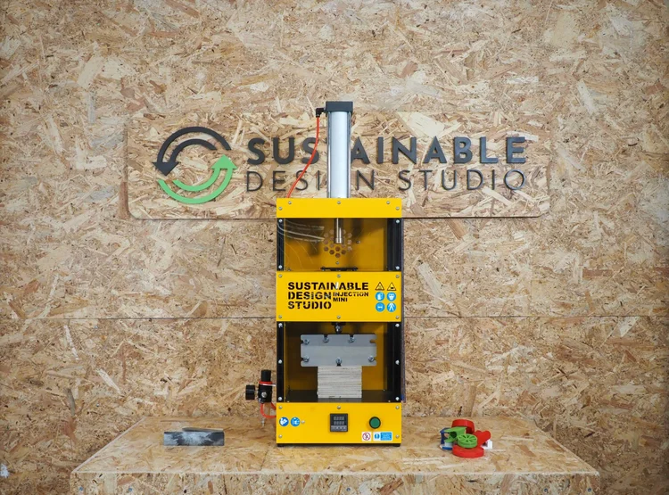 The Sustainable Design Studio Injection Mini, a desktop injection molding machine.