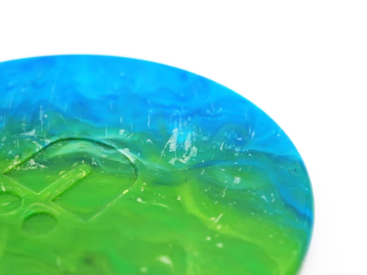 A moulded part splitting into visible layers that peel away from each other.