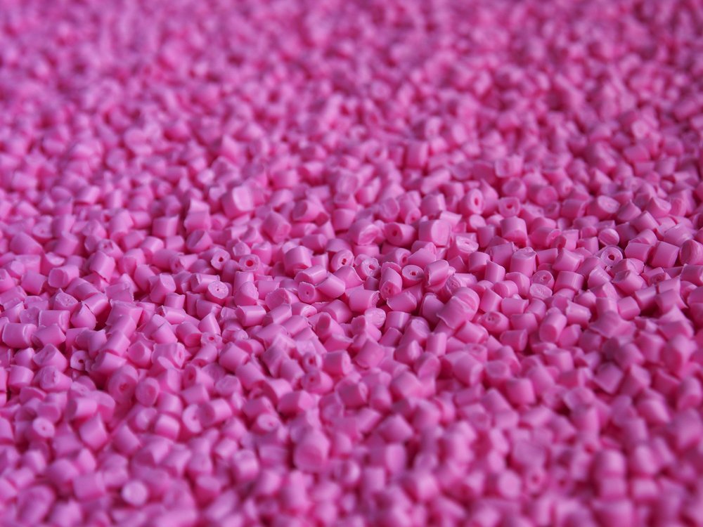 Recycled plastic pellets, the industrial-standard intermediate produced by extrusion and pelletising.