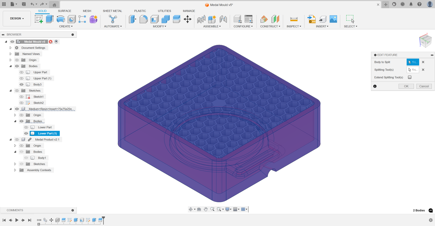 The Split Body command splitting the hexagonal texture with the hollowed-out mould halves.