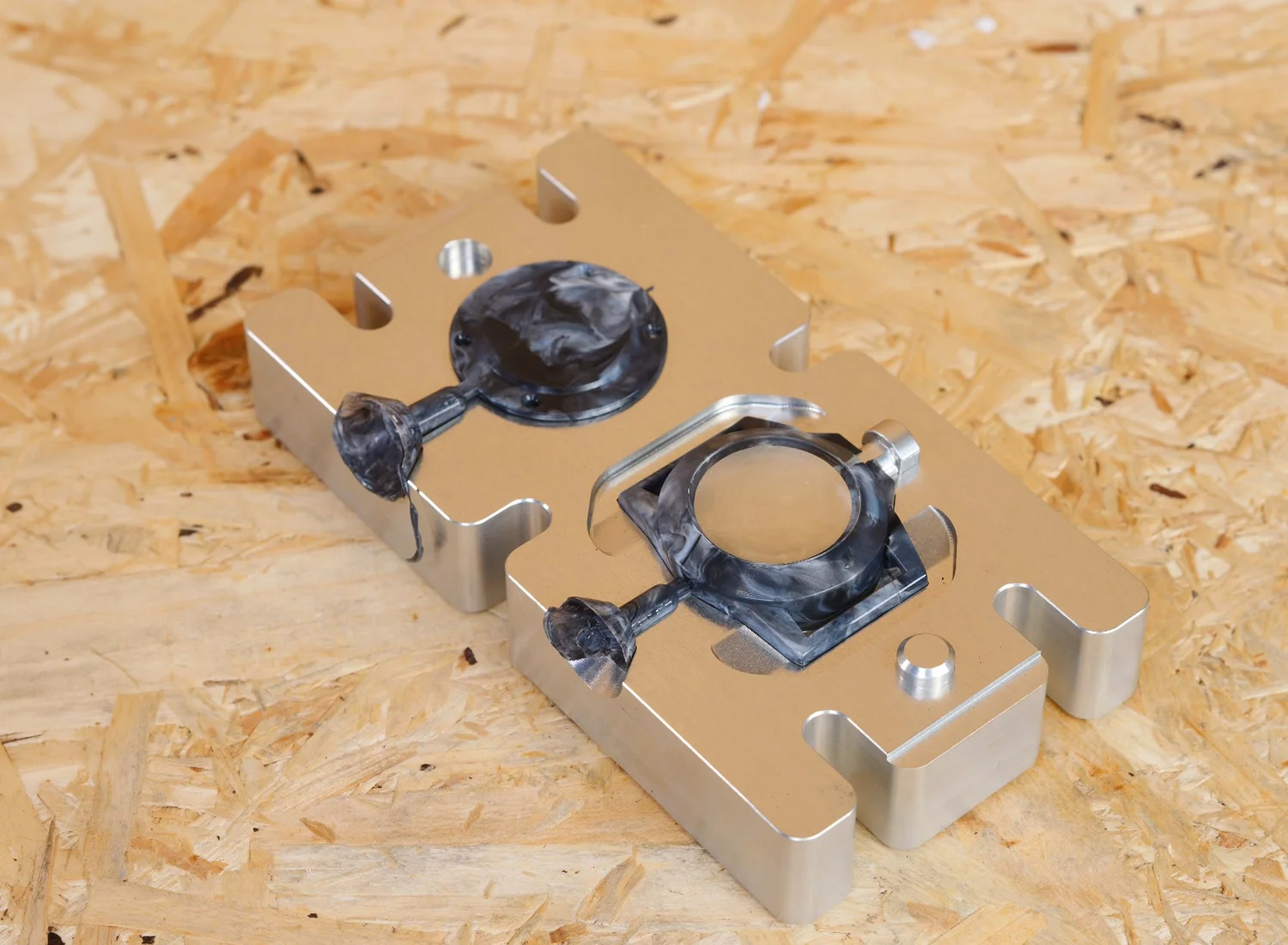 Watch body and back plate released from the mould halves.