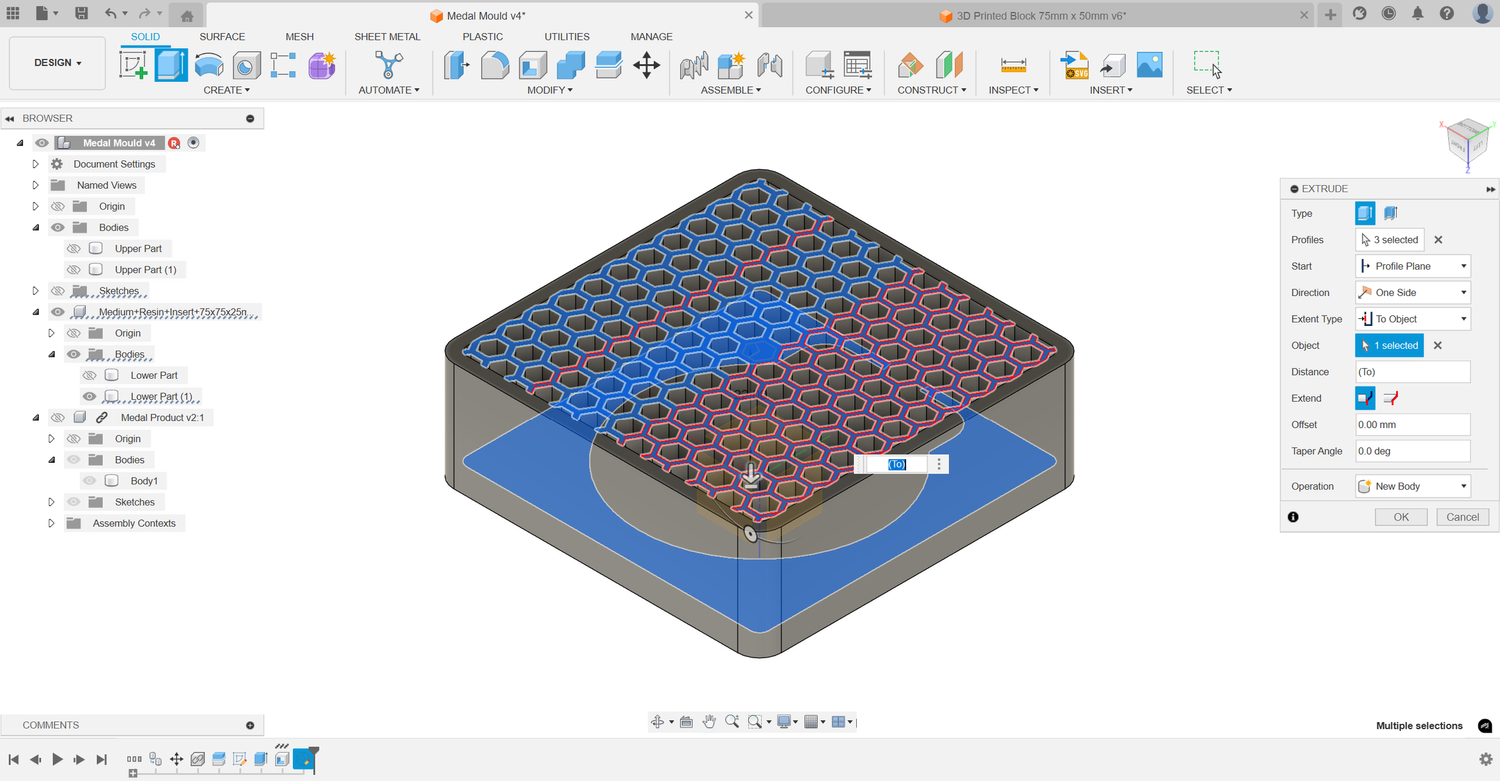 A hexagonal pattern sketched and extruded on the mould face to create a textured surface.