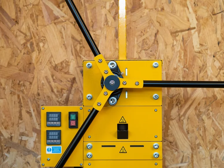Close-up of the Arbour Injection Machine V2 rack and pinion handles for hand-powered injection