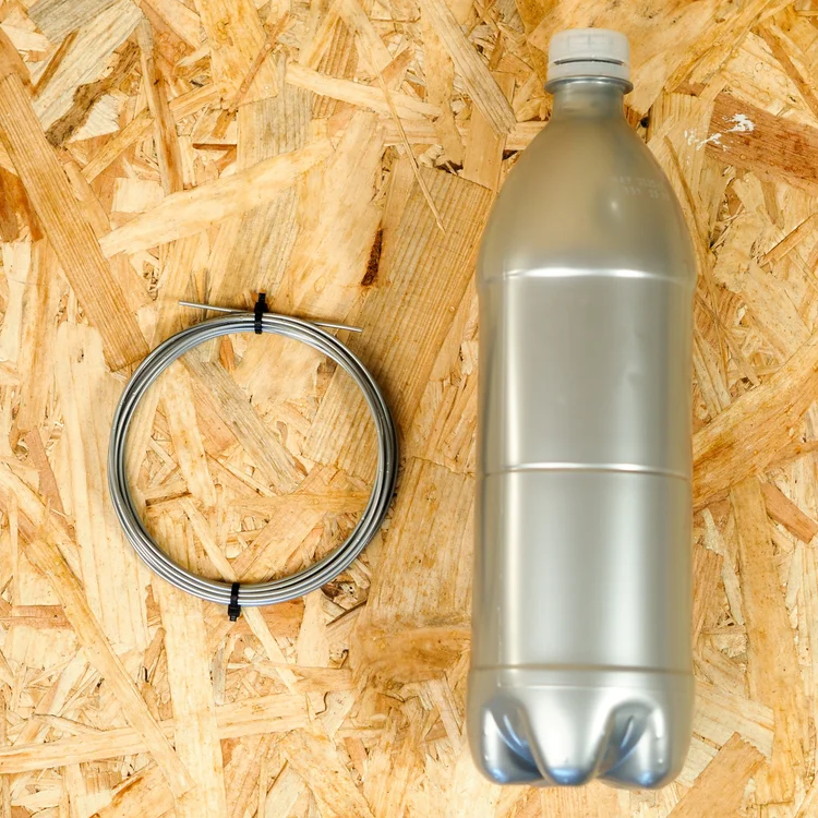A PET bottle being wound into 1.75mm filament on the Filament Maker