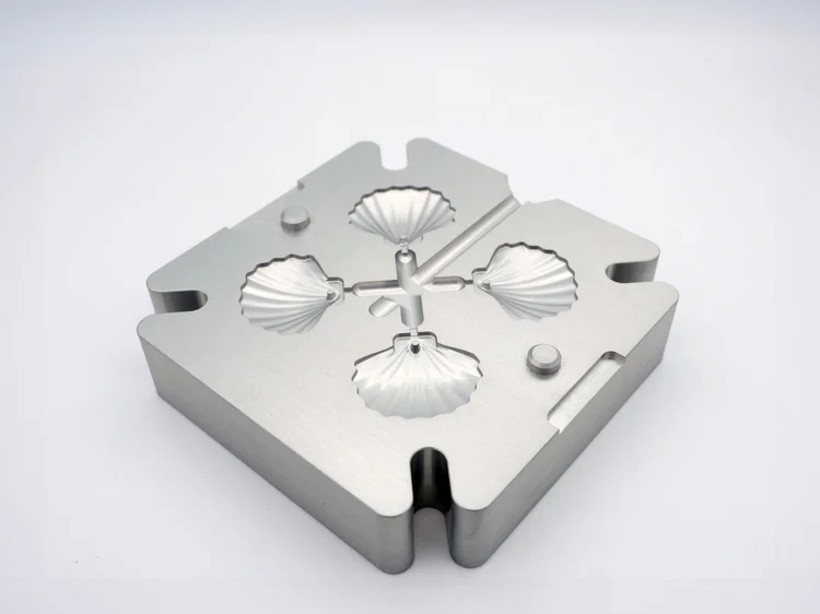 Shell-shaped pieces moulded from recycled plastic