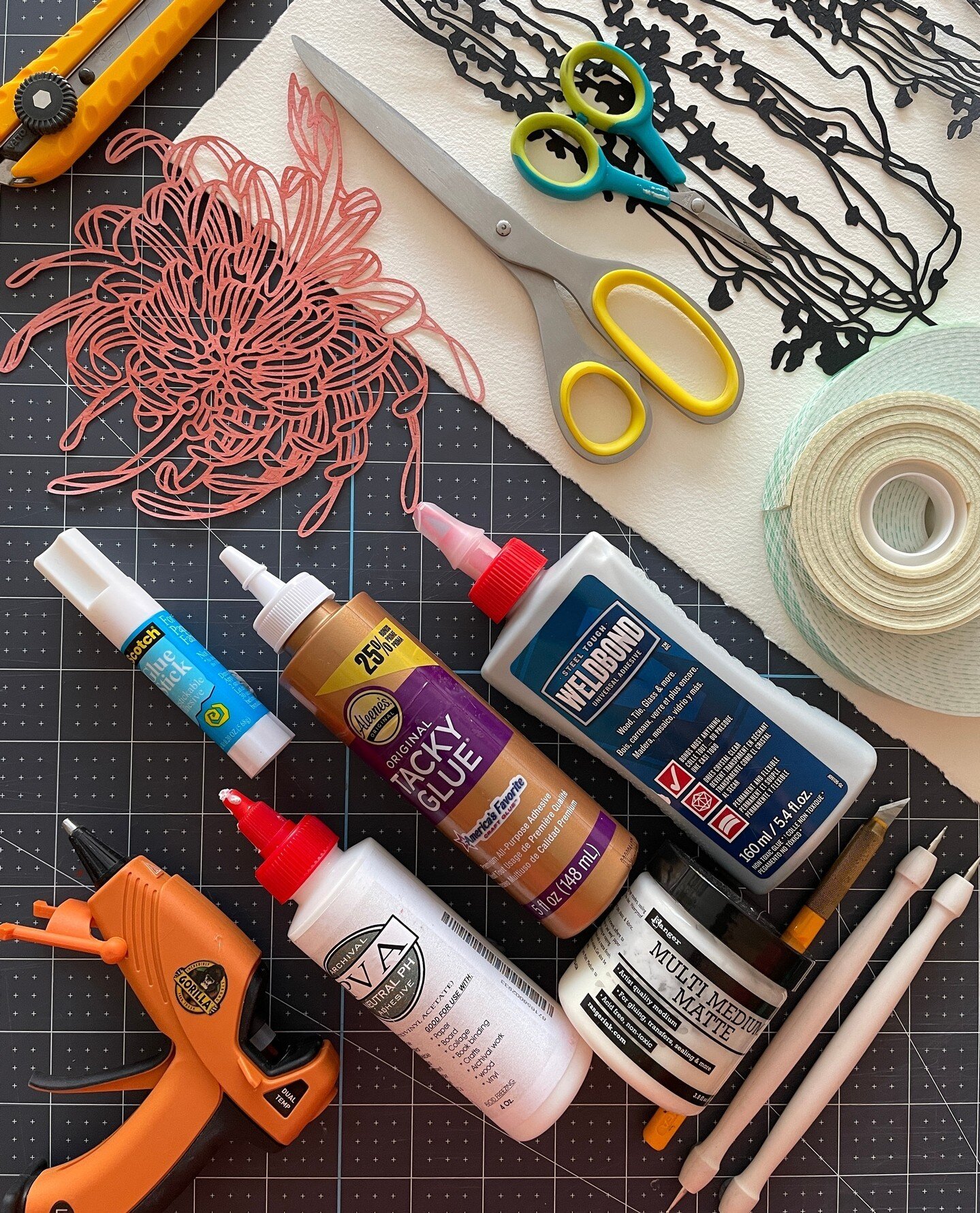 Day 21 of #amonthinpaper : adhesives! ⁠
⁠
I am always trying new adhesives, but my go to is either Tacky Glue or Weldbond. Both are low in moisture, which prevents paper from buckling. I use paper weights afterwards. I've also tried normal PVA glue a