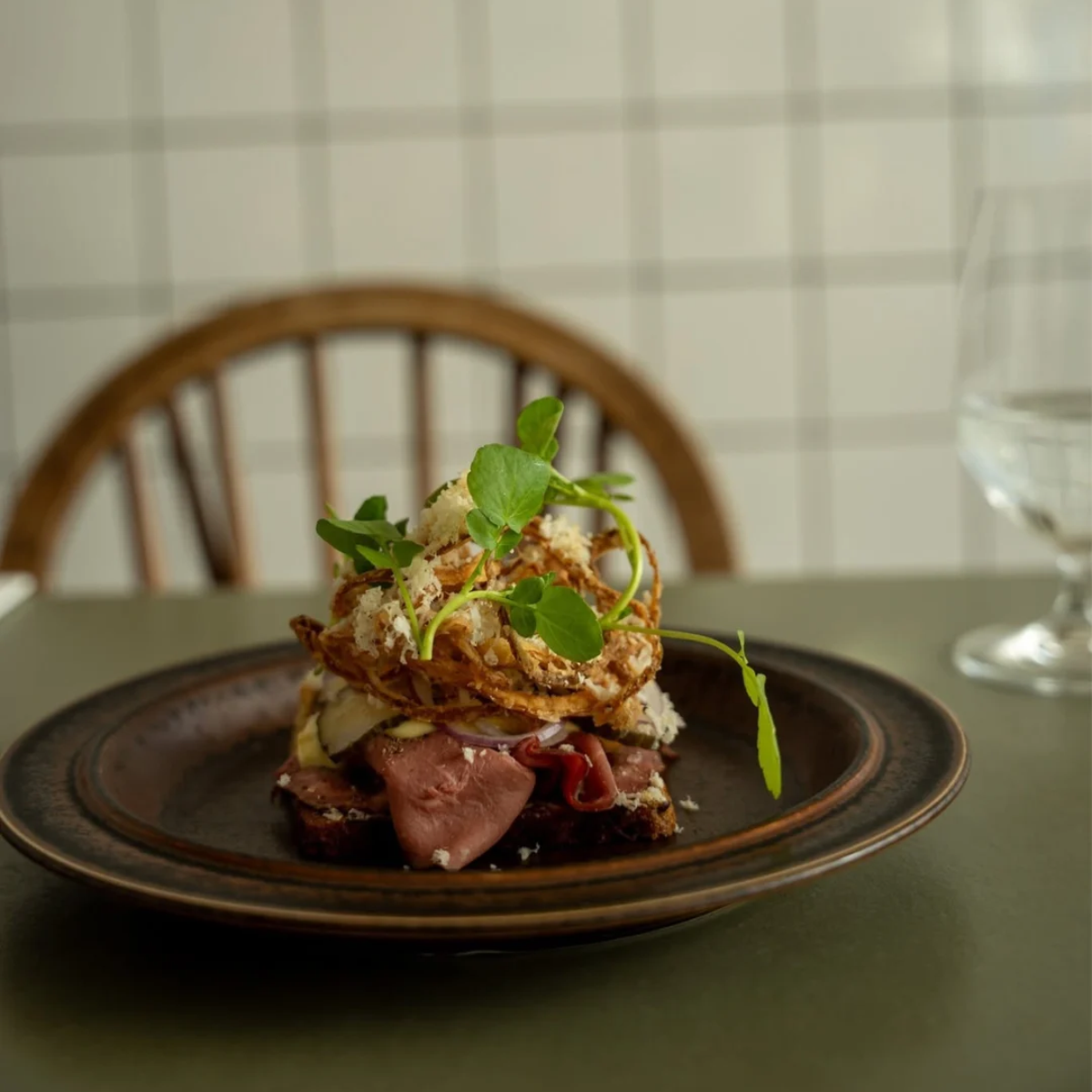 Roast beef smorrebrod with crispy onions, grated horseradish and watercress at Fleisch in Copenhagen.