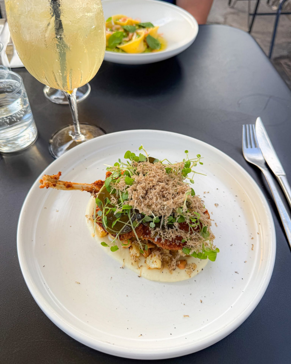 Guinea fowl schnitzel with herbs and grated topping served at Restaurant Fleisch in Copenhagen’s Meatpacking District.