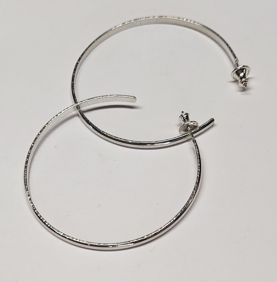 How's your new year going? Hope it's great! I've gotten a few custom orders done including these 2&quot; textured hoops from my favorite Argentium sterling silver. They were to replace fun but not silver favorites for a returning client (which I grea