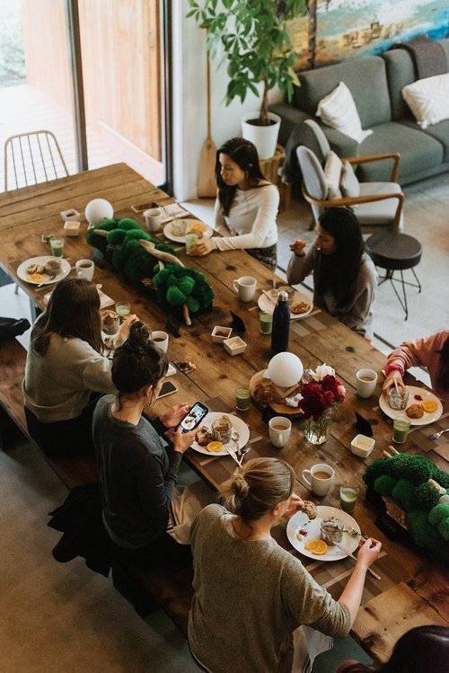 Large communal dining table in the Onyx Lodge