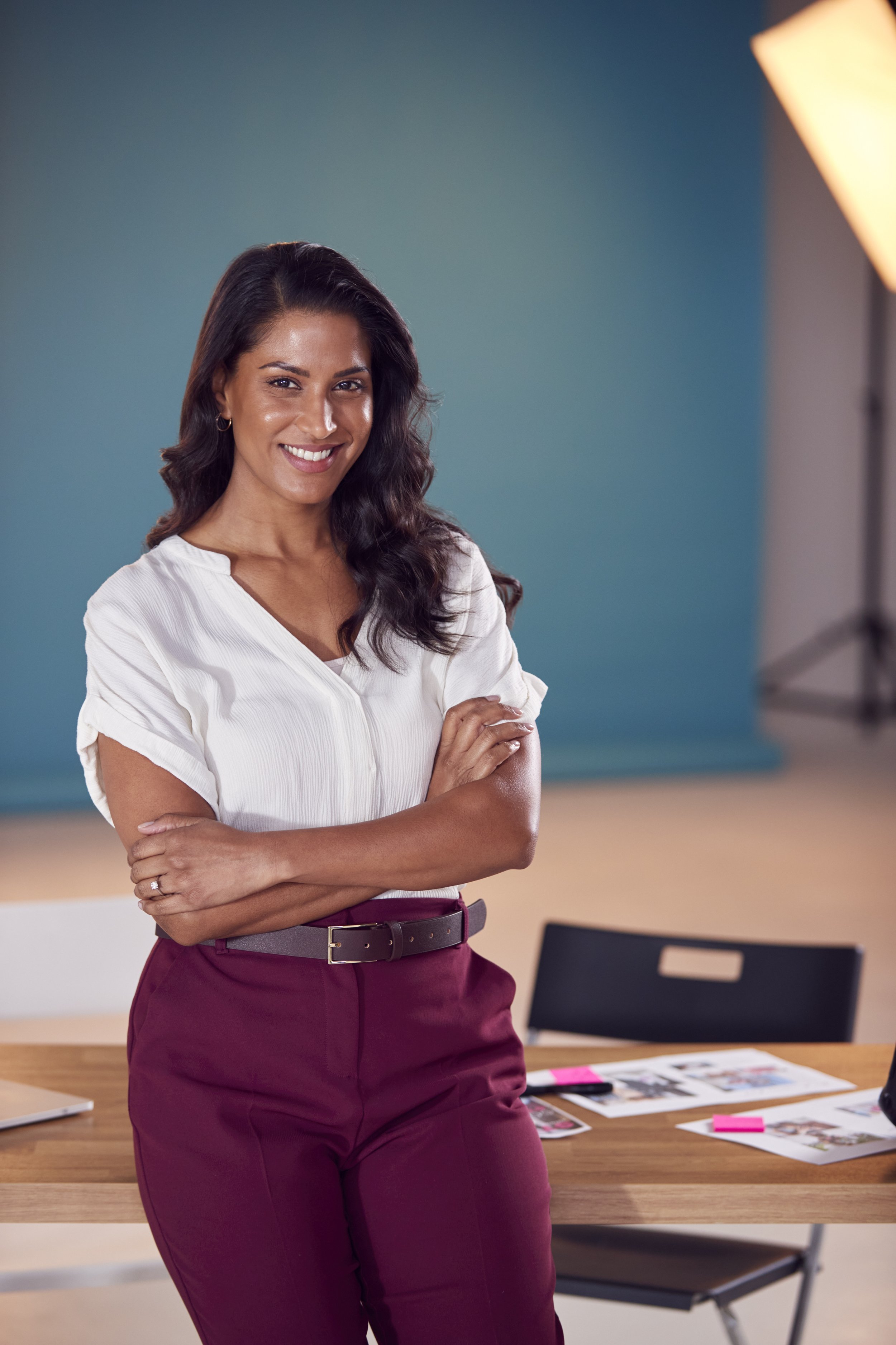 portrait-of-mature-female-photographer-at-desk-in-2024-10-19-08-43-54-utc.jpeg