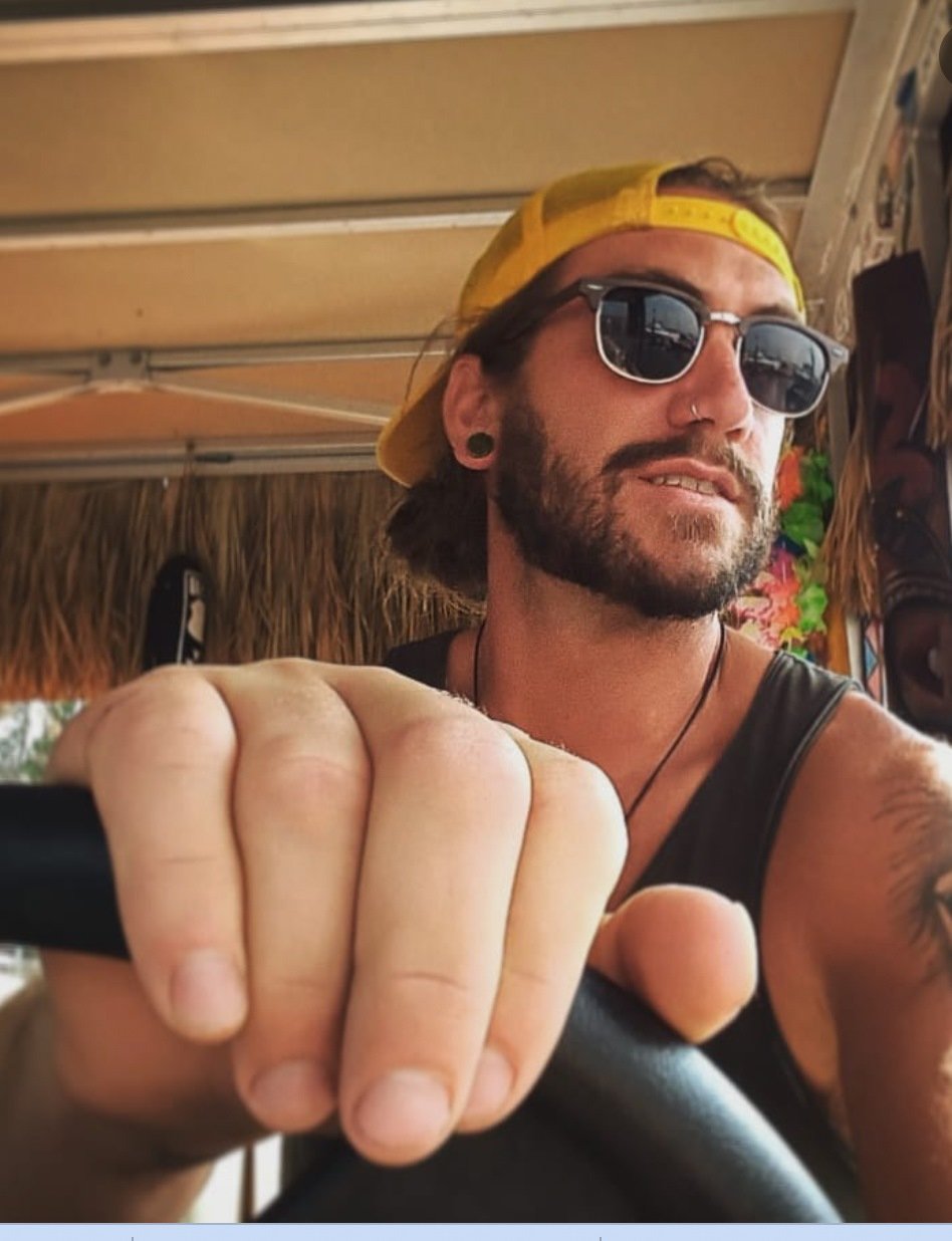 Captain Jason from Salty Soul Charters driving a charter boat in Key West, Florida