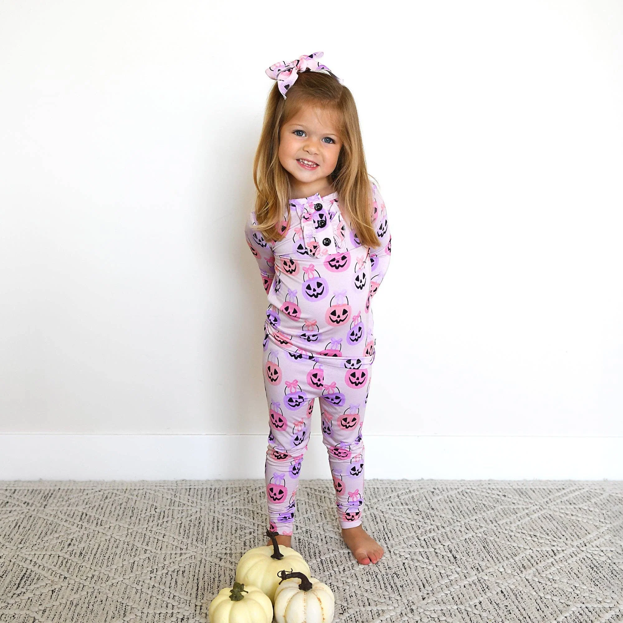 emmy-ruffle-two-piece-bamboo-halloween-pumpkins-outfit.jpg