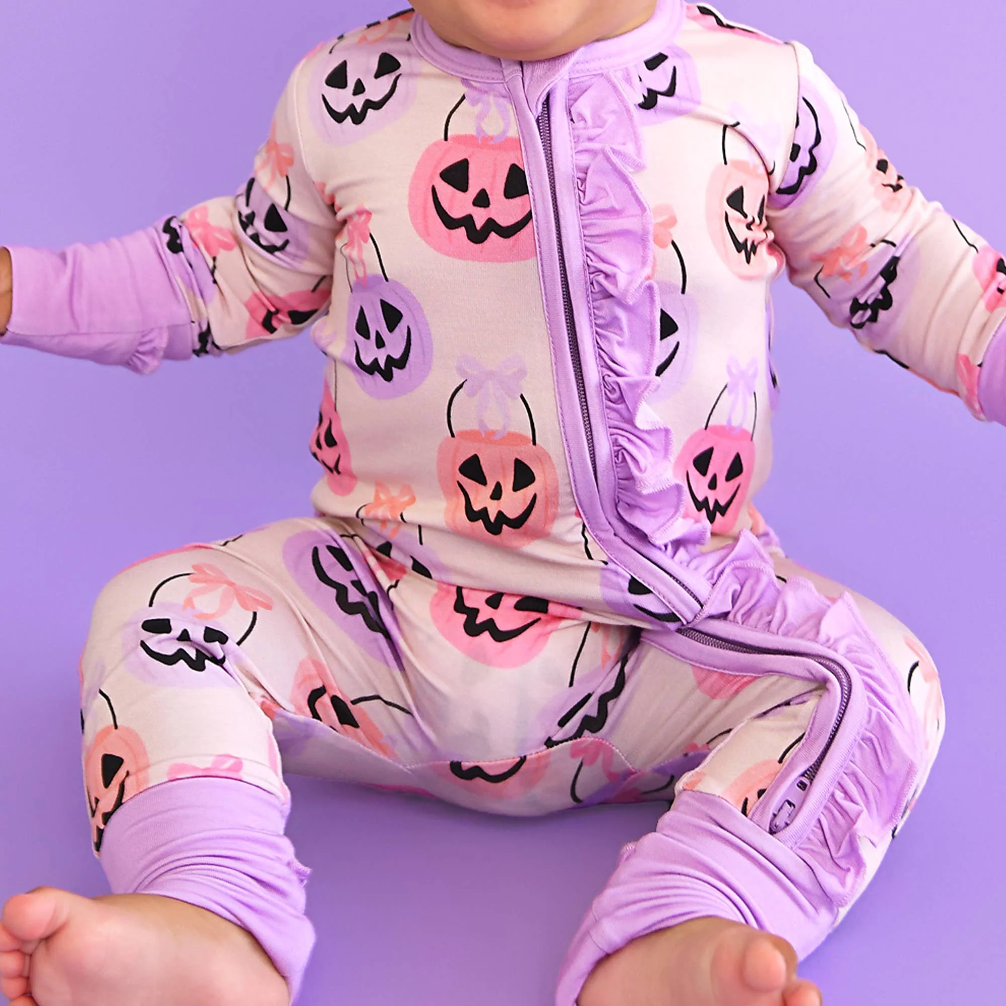 emmy-ruffle-zip-bamboo-halloween-pumpkins-baby-outfit-16.jpg