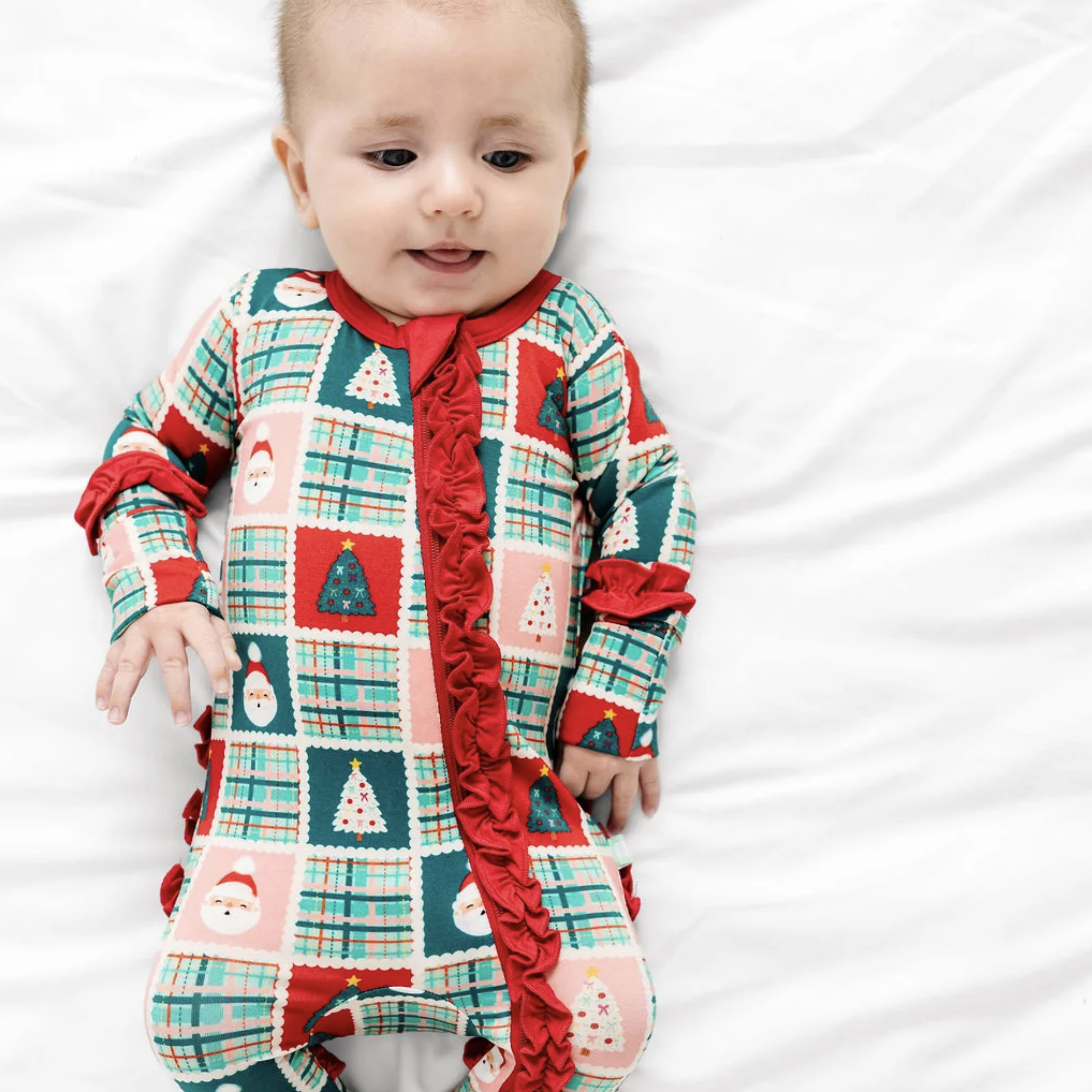 Patchwork Santas Ruffle Footy